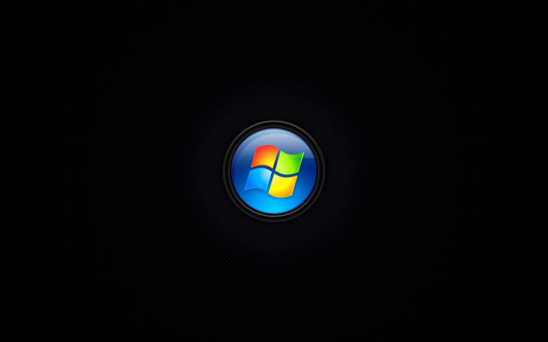 Black Windows 桌布 壁紙 — 一個發光的Windows標誌置於深色紋理背景中央，柔和光線向外擴散。