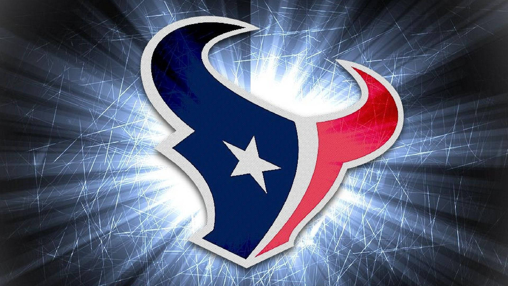 Texans 桌布 壁紙 — 一個發光的休士頓德州人標誌，帶有藍色、紅色和白色的角，在刮花的金屬背景上散發出明亮的光芒。