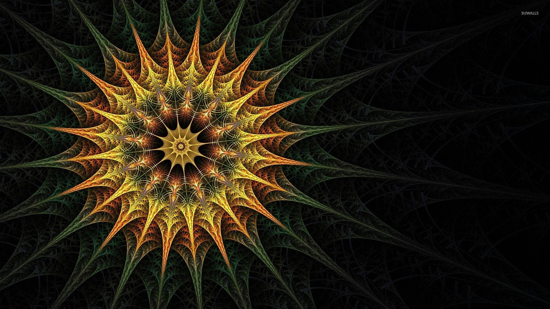 太陽 桌布 壁紙 — 一個發光的分形星爆，金色橙色尖刺從中心核心輻射出來，背景是深綠色和黑色的網狀圖案。
