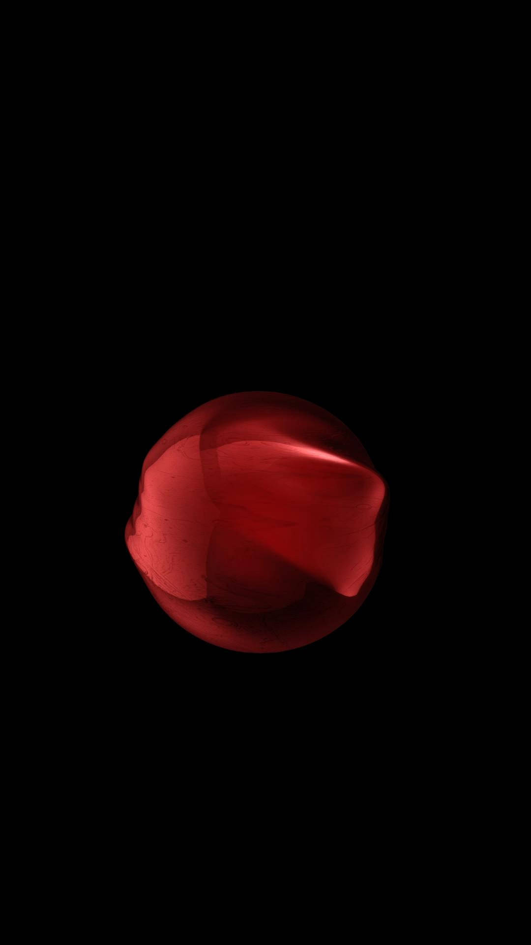 紅色 iPhone 桌布 壁紙 — 一個發光的半透明紅色球體，帶有柔和的內部高光，獨自漂浮在漆黑的虛空中。