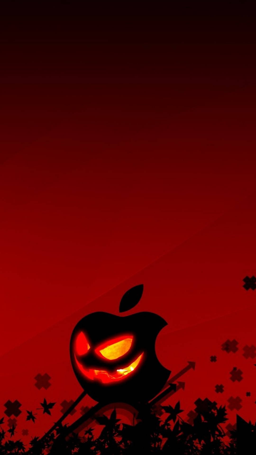 Cute Halloween Phone 桌布 壁紙 — 一個發光的南瓜燈Apple標誌，帶有火熱的眼睛和笑容，置於深紅色漸變背景上，散落著黑色樹葉。