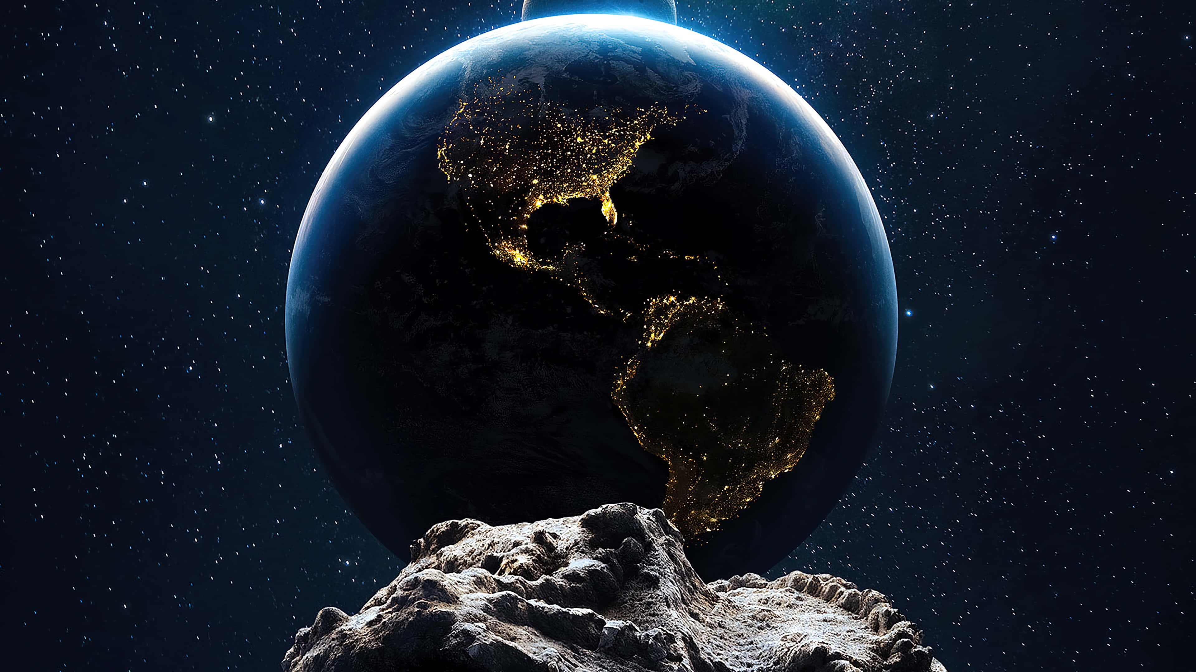 地球 桌布 壁紙 — 一個發光的地球，城市燈光懸浮在崎嶇的小行星之上，背景是繁星點點的宇宙。
