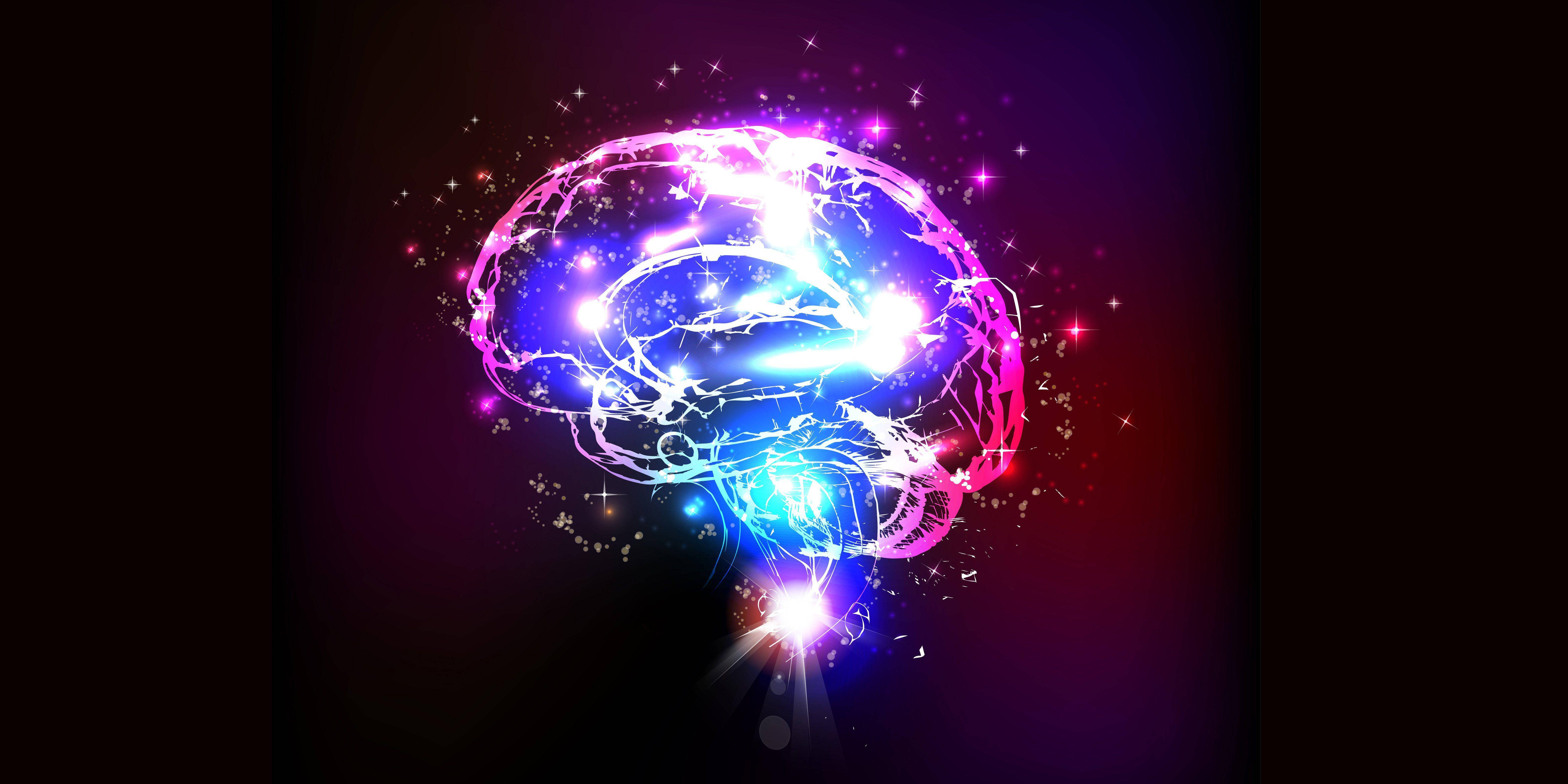 Brain 桌布 壁紙 — 一個發光的大腦在黑暗的宇宙背景中散發出電藍色和粉紅色的能量，伴隨著閃爍的星星。
