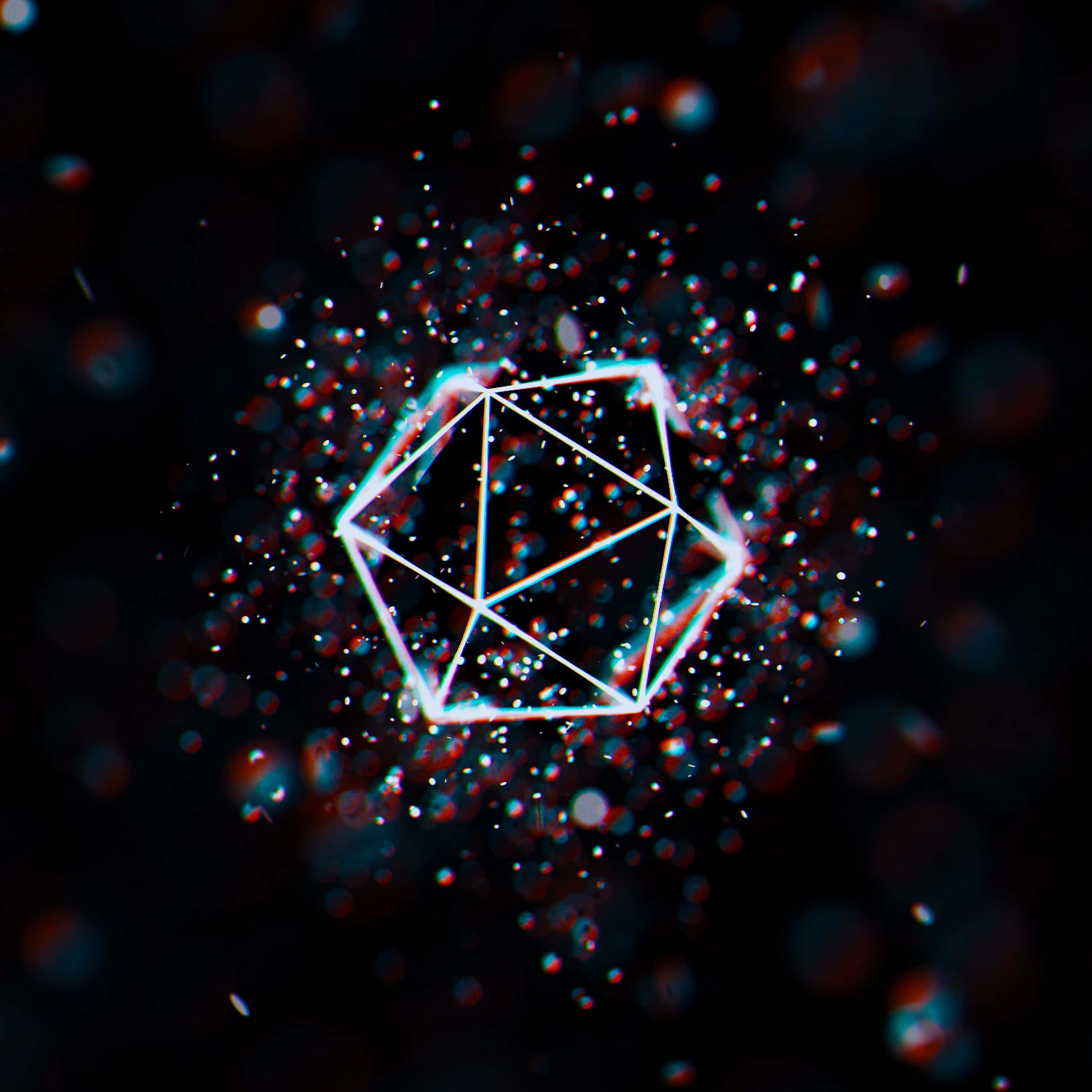 2560x1440 動態圖片 桌布 壁紙 — 一個發光的幾何多面體在黑暗虛空中，於色彩繽紛的粒子宇宙場中脈動著霓虹光芒。