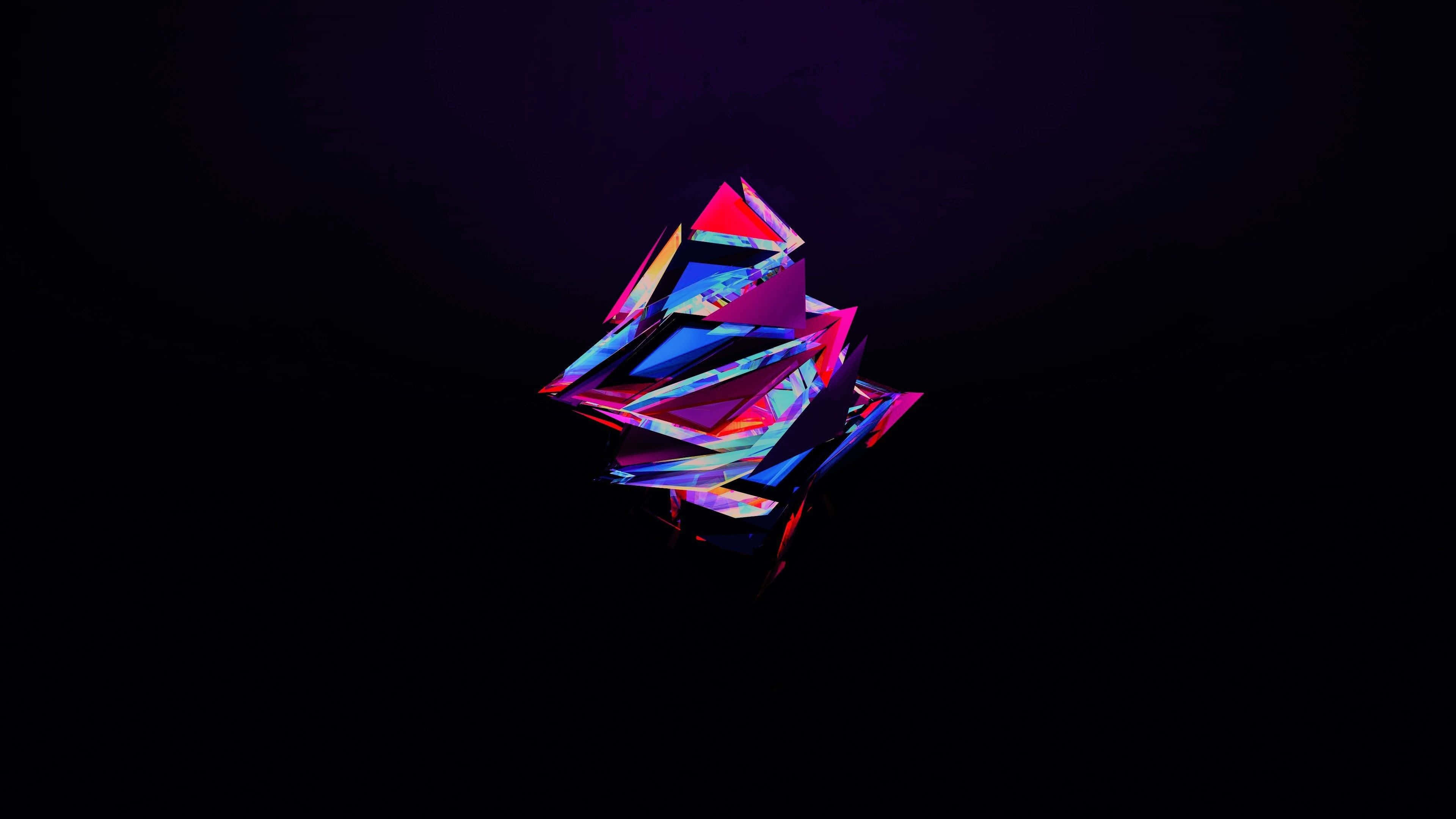 Geometric Desktop 桌布 壁紙 — 一個發光的幾何水晶結構在深邃的黑色虛空中脈動著霓虹粉紅、藍色和紫色的色調。