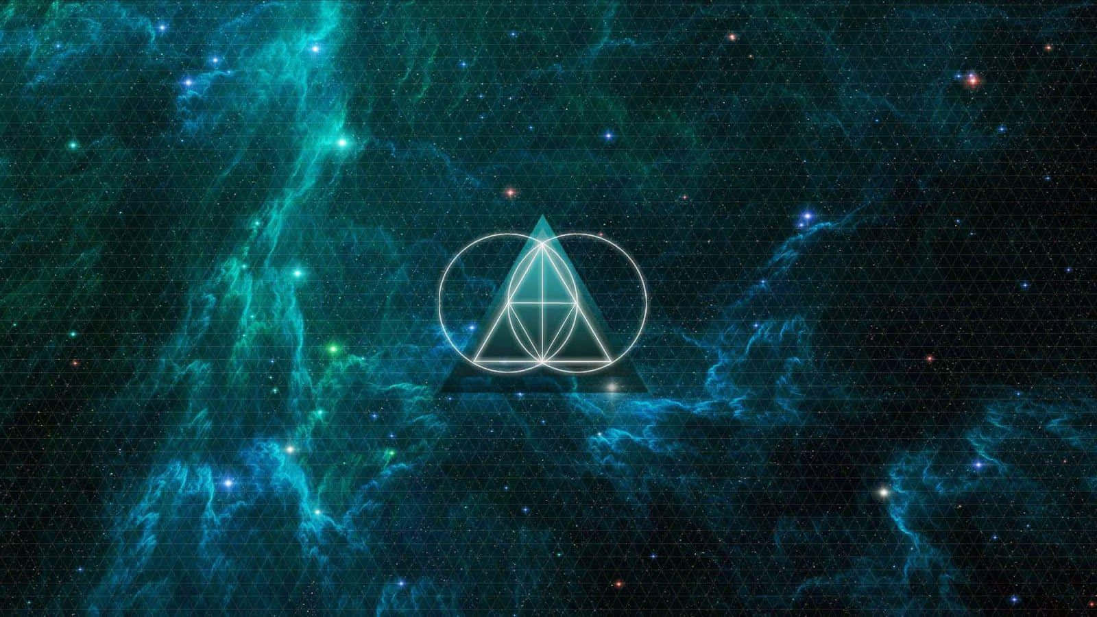 Shapes 桌布 壁紙 — 一個發光的幾何符號漂浮在旋轉的藍綠色和黑色宇宙星雲中，點綴著星星。