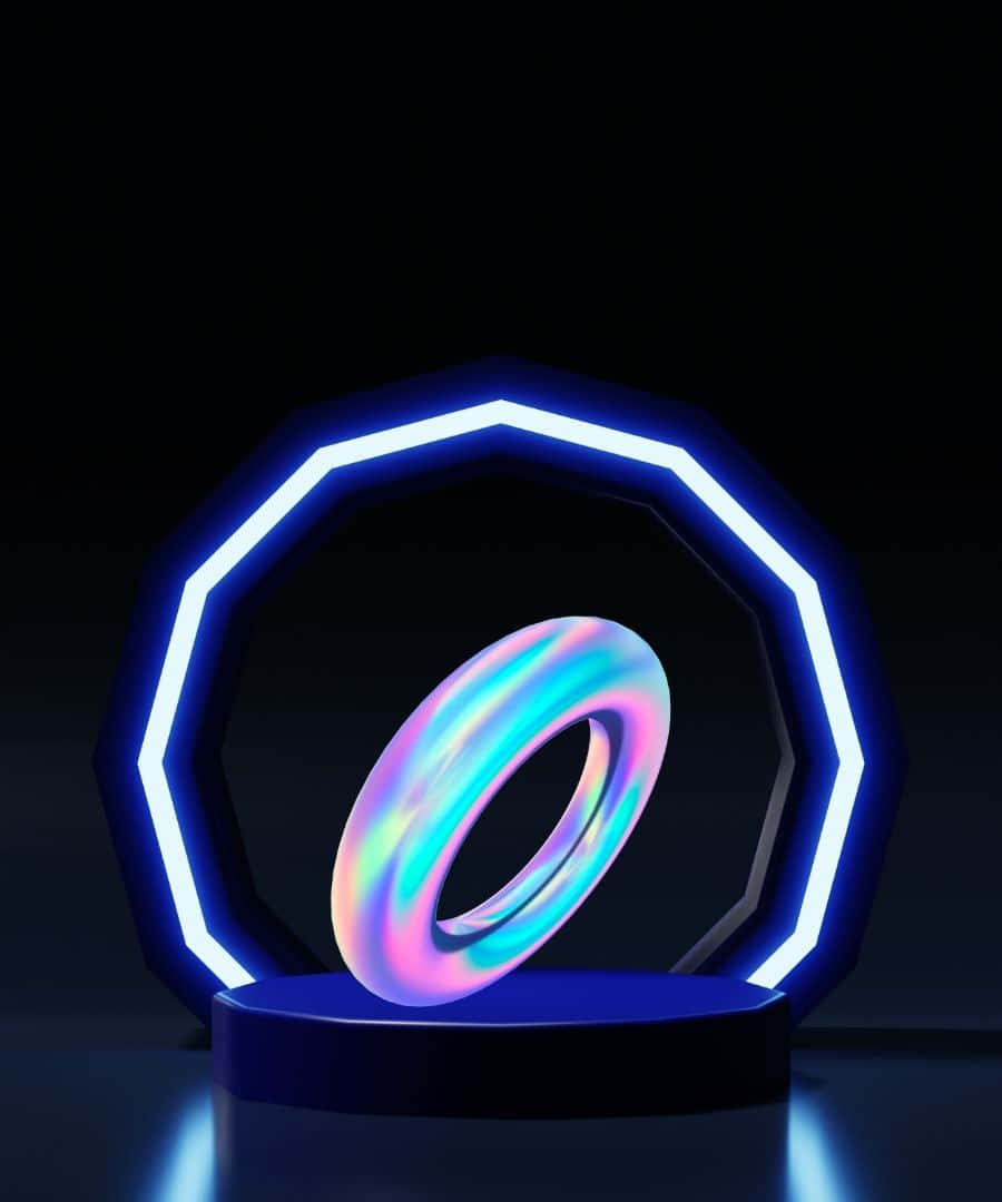 1080p 桌布 壁紙 — 一個發光的彩虹色環在藍色霓虹八角框內旋轉，背景為黑色。