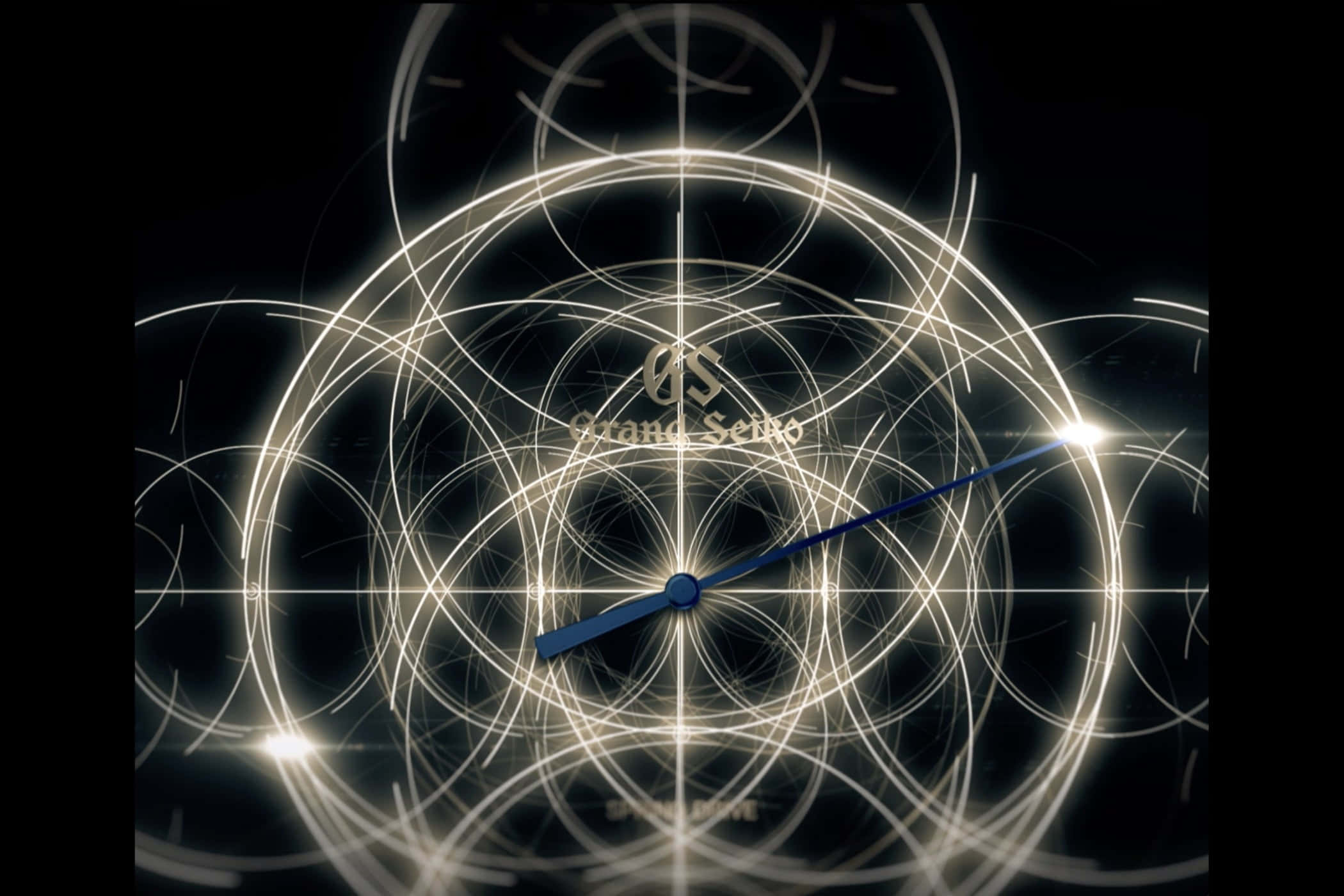 Alchemy 桌布 壁紙 — 一個發光的抽象時鐘，帶有相交的光圈和藍色指針，背景為深色。