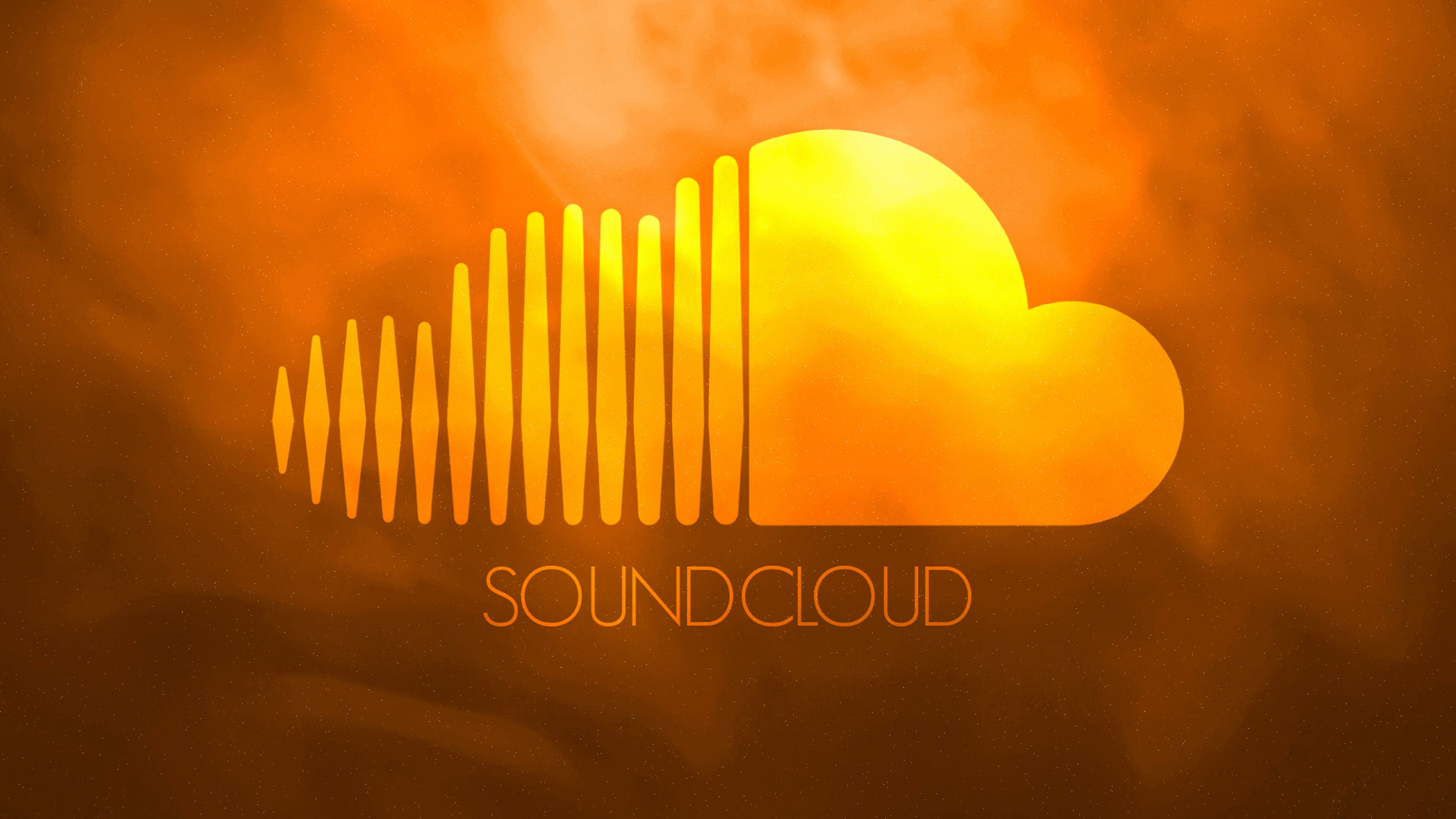 Soundcloud 桌布 壁紙 — 一個發光的橙色SoundCloud標誌，帶有聲波條，背景是煙霧繚繞的火熱背景。