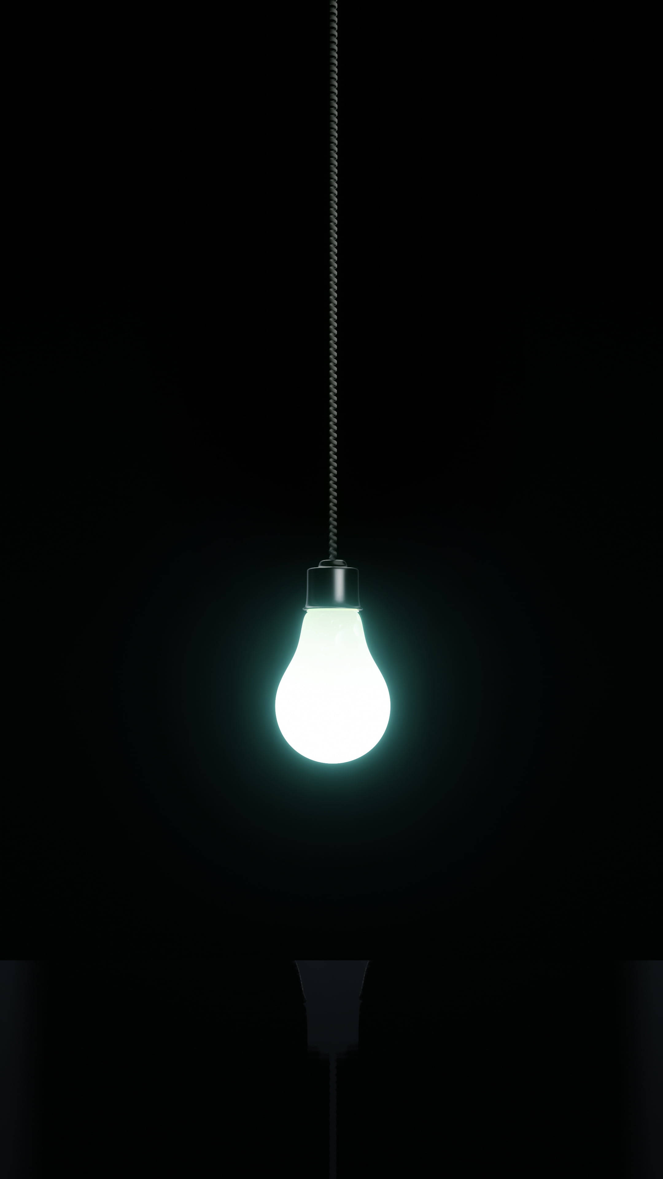 手機 桌布 壁紙 — 一個發光的燈泡用電線懸掛在漆黑的背景上，投射出柔和的光暈。