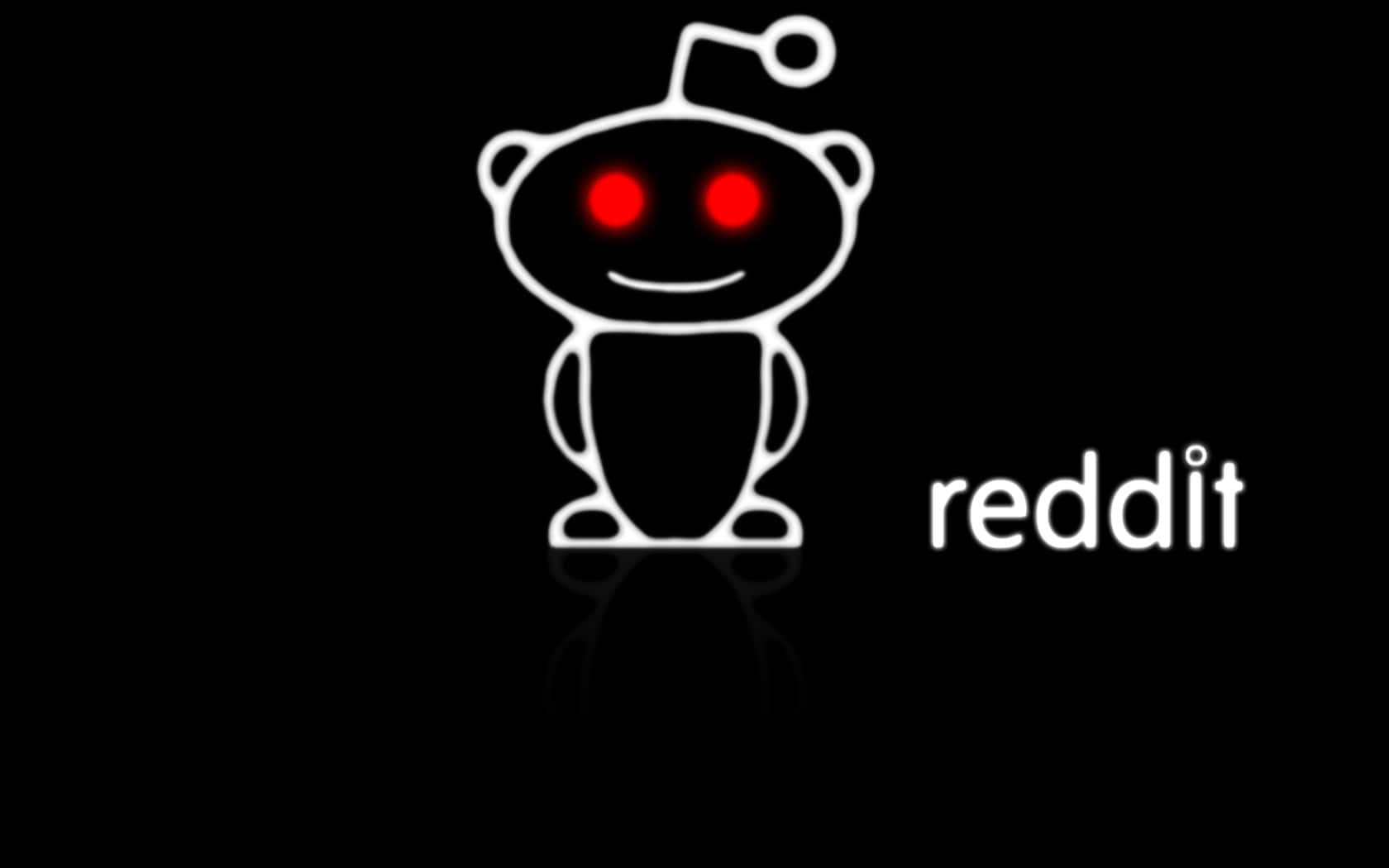 Reddit 桌布 壁紙 — 一個發光的白色 Reddit 外星人吉祥物，帶有鮮紅色的眼睛，站在黑色背景上，帶有微妙的倒影。