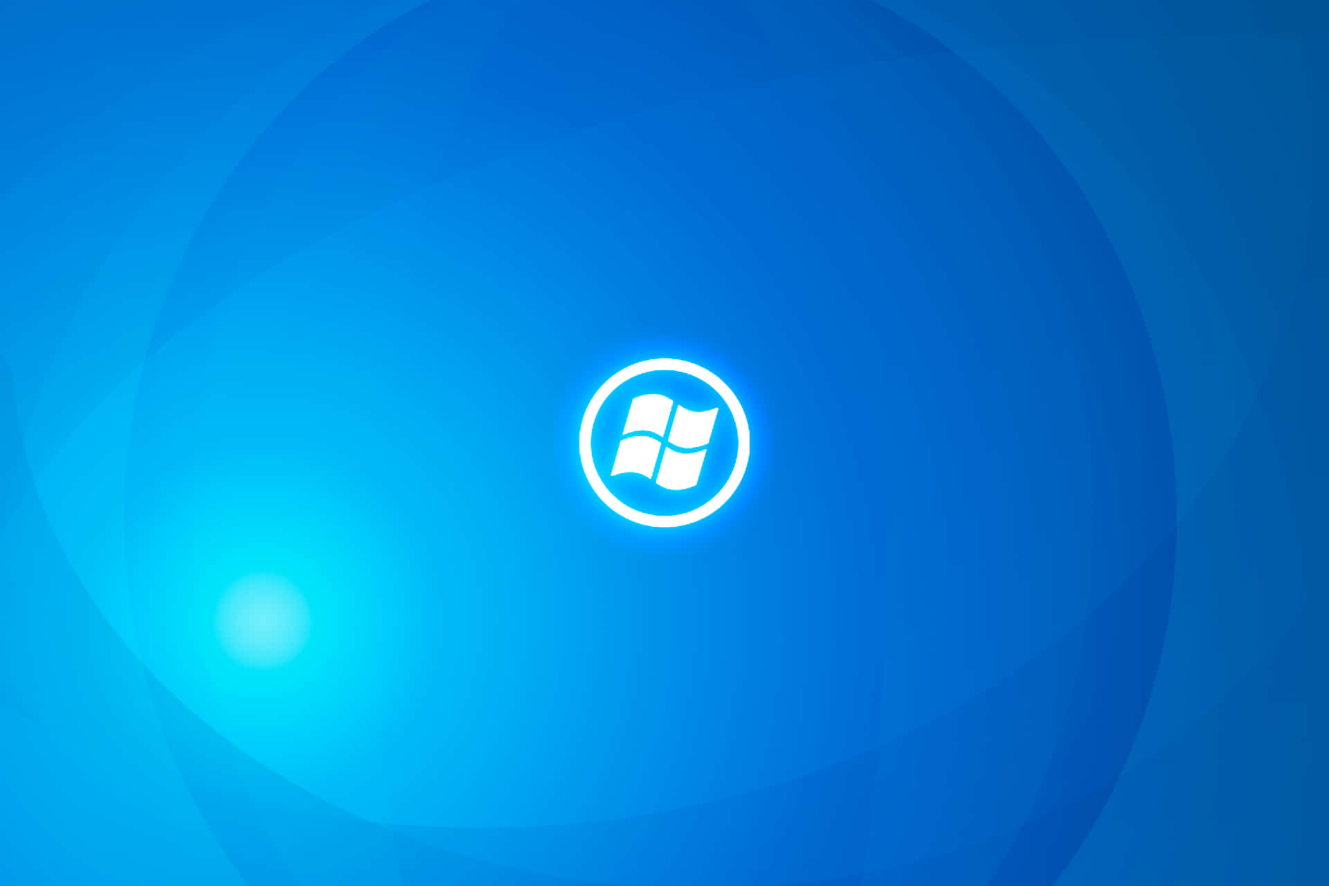 Windows標誌在藍色漸變背景上發光 — Windows 10 GIF 壁紙