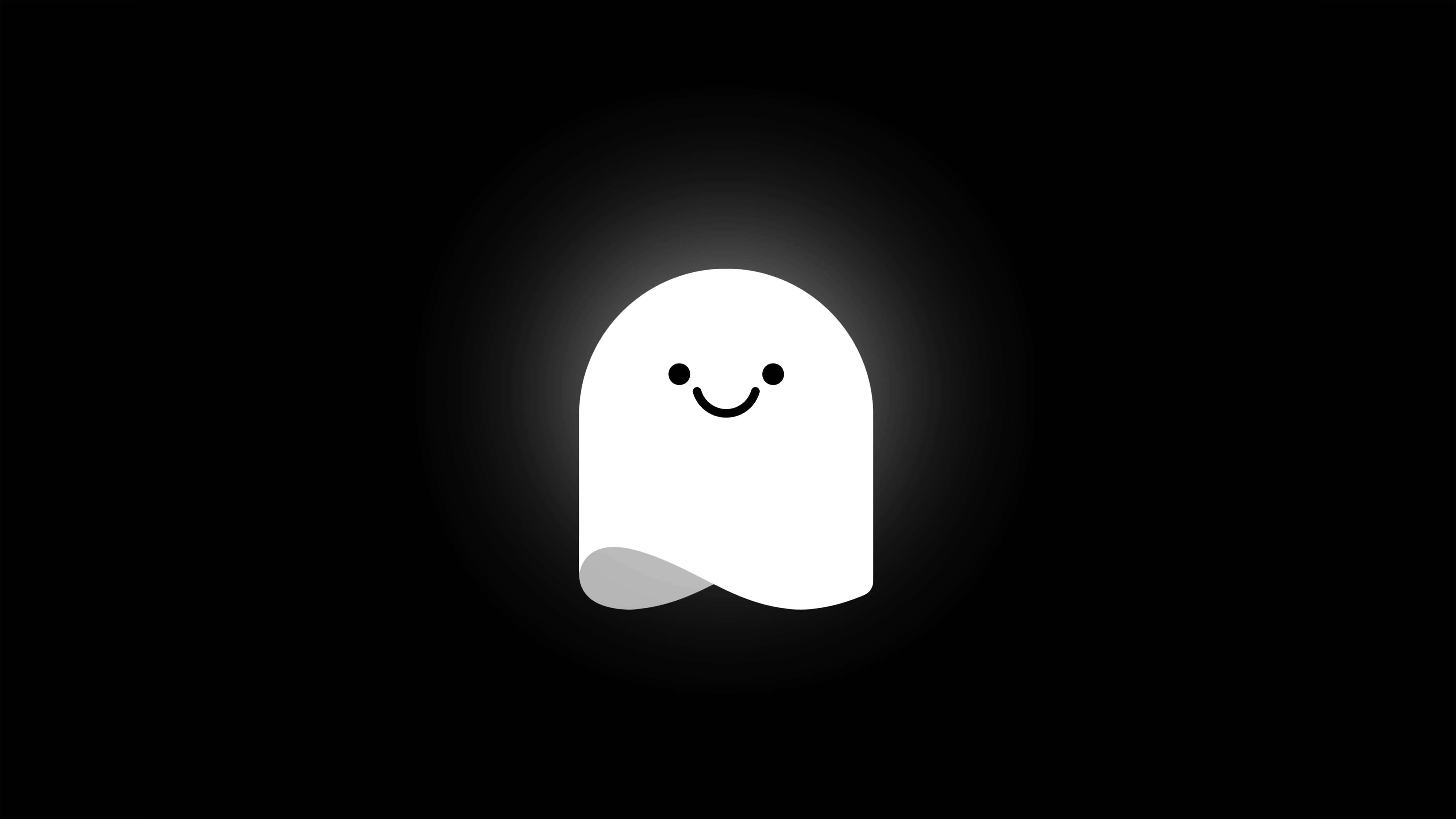 Cute Ghost 桌布 壁紙 — 一個發光的白色卡通鬼魂，帶著微笑的臉，在黑暗的背景中漂浮。