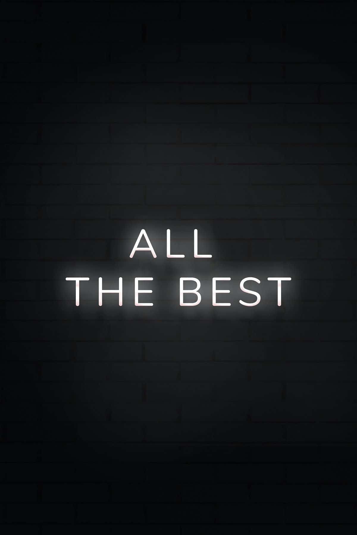 Motivational Quotes 桌布 壁紙 — 一個發光的白色霓虹燈牌，上面寫著「ALL THE BEST」，用柔和的光線照亮了深色磚牆。