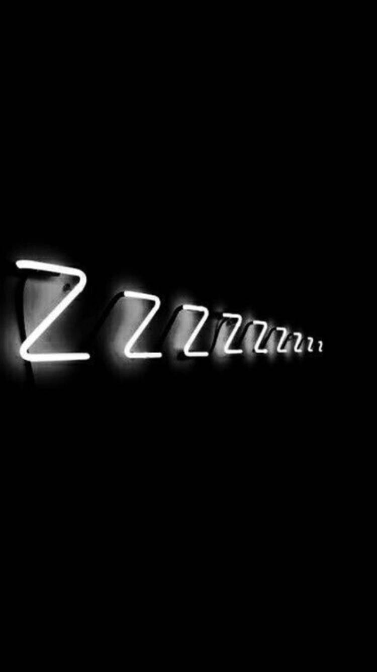 黑白 桌布 壁紙 — 一個發光的白色霓虹燈牌，在漆黑背景上拼出「Zzzzz」。