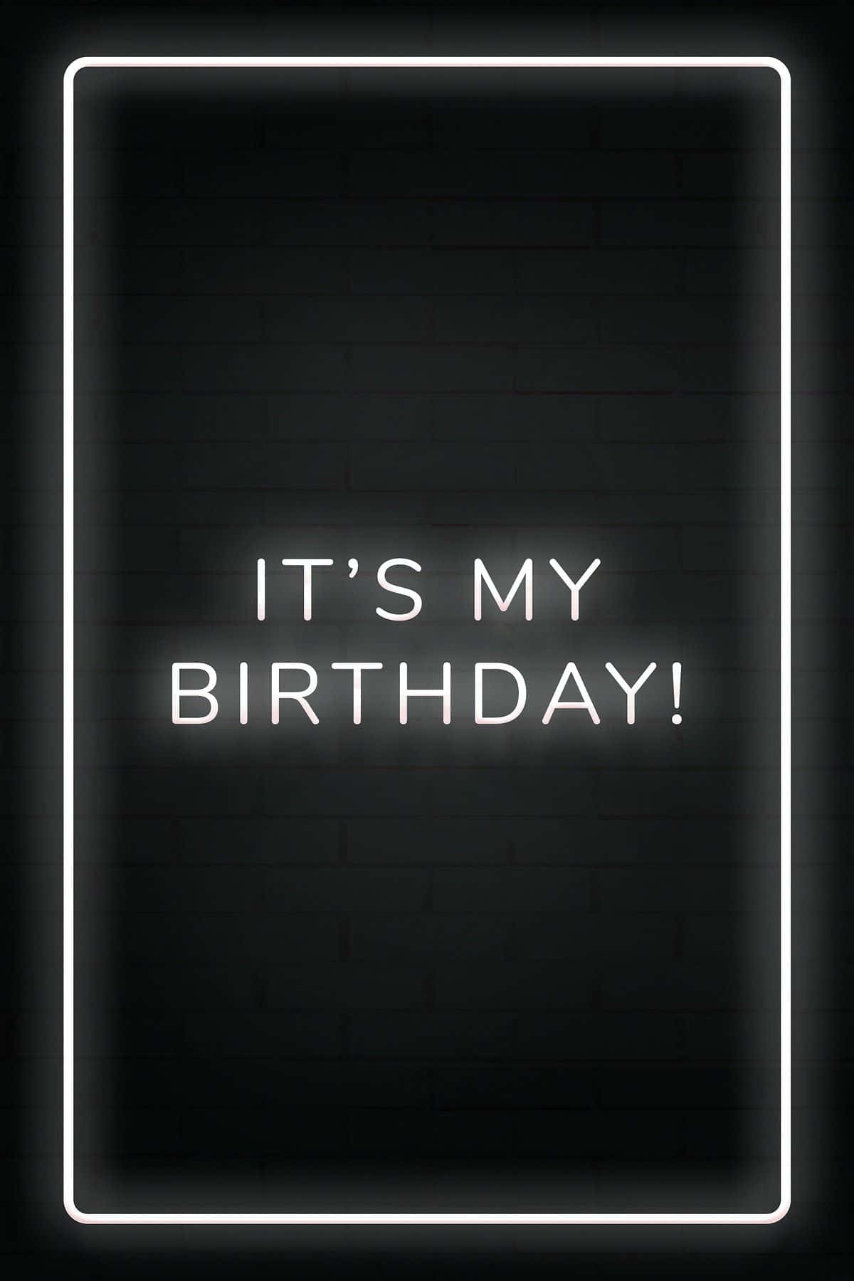 Birthday 桌布 壁紙 — 一個發光的白色霓虹燈牌寫著「IT'S MY BIRTHDAY!」，背景是深色磚牆，並以霓虹邊框框住。