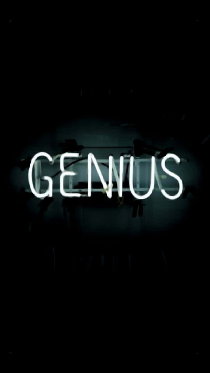 Dark Genius 桌布 壁紙 — 一個發光的白色霓虹燈牌拼出GENIUS，照亮了一個黑暗、陰暗的房間，房間內有懸掛物體的模糊輪廓。