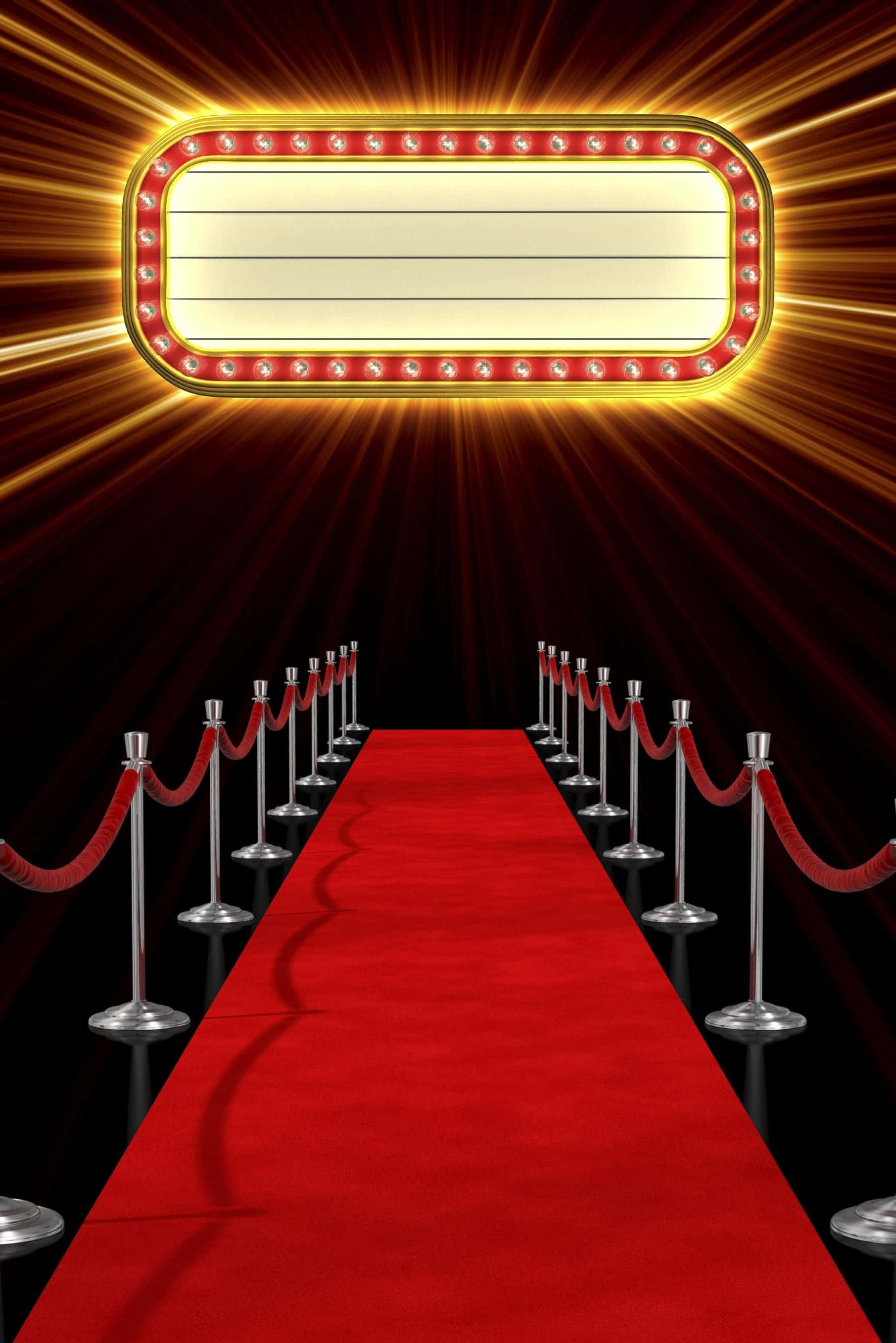 Red Carpet 桌布 壁紙 — 一個發光的簷篷標誌照亮了一條由天鵝絨繩索圍繞、通往黑暗的宏偉紅地毯。
