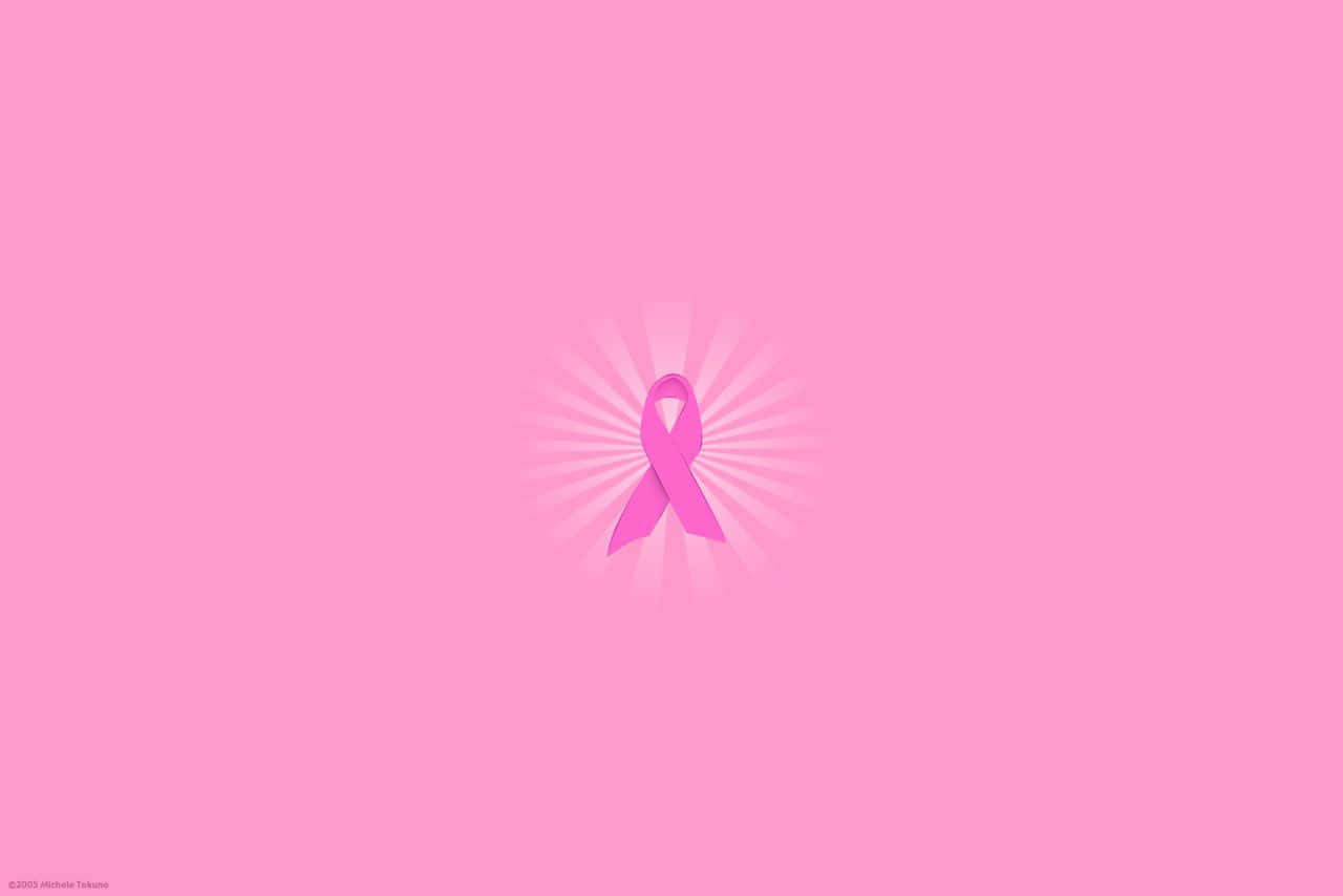 Pink Ribbon 桌布 壁紙 — 一個發光的粉紅絲帶符號，用於乳癌意識，居中於柔和的粉紅背景上，帶有微妙的陽光射線。