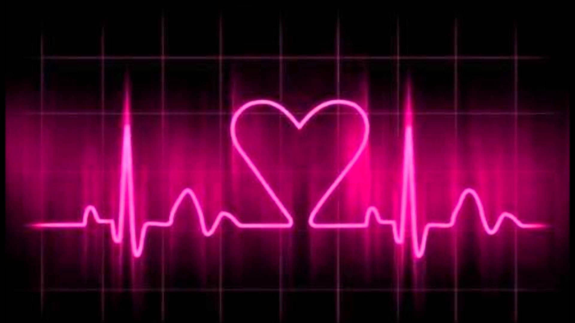 Heartbeat 桌布 壁紙 — 一個發光的粉紅色心形在黑暗網格背景上的霓虹心跳線內脈動。