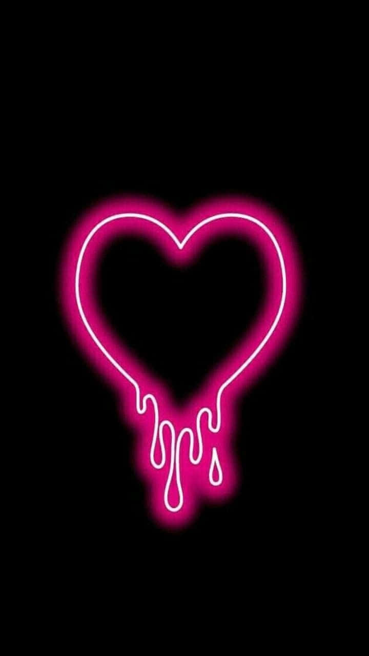 Pink Neon Aesthetic 桌布 壁紙 — 一個發光的粉紅色霓虹心形，邊緣滴落，在純黑色背景上跳動。
