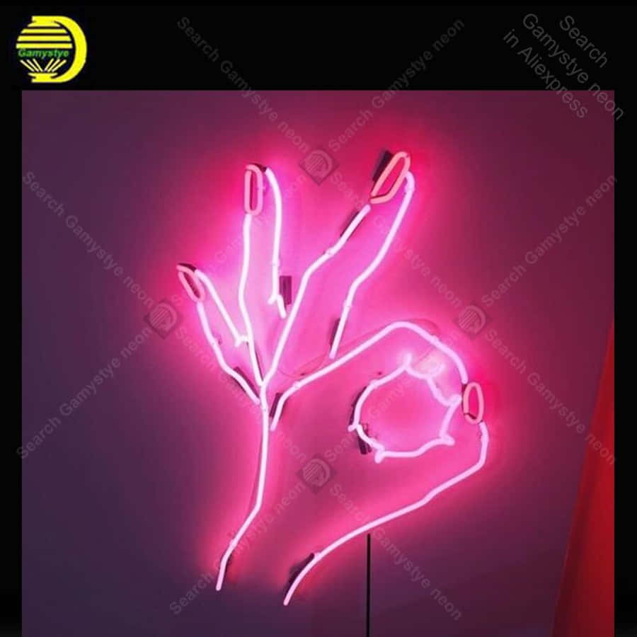 Aesthetic Neon 桌布 壁紙 — 一個發光的粉紅色霓虹燈牌，形狀像一隻手在黑暗的牆上做出「OK」手勢。
