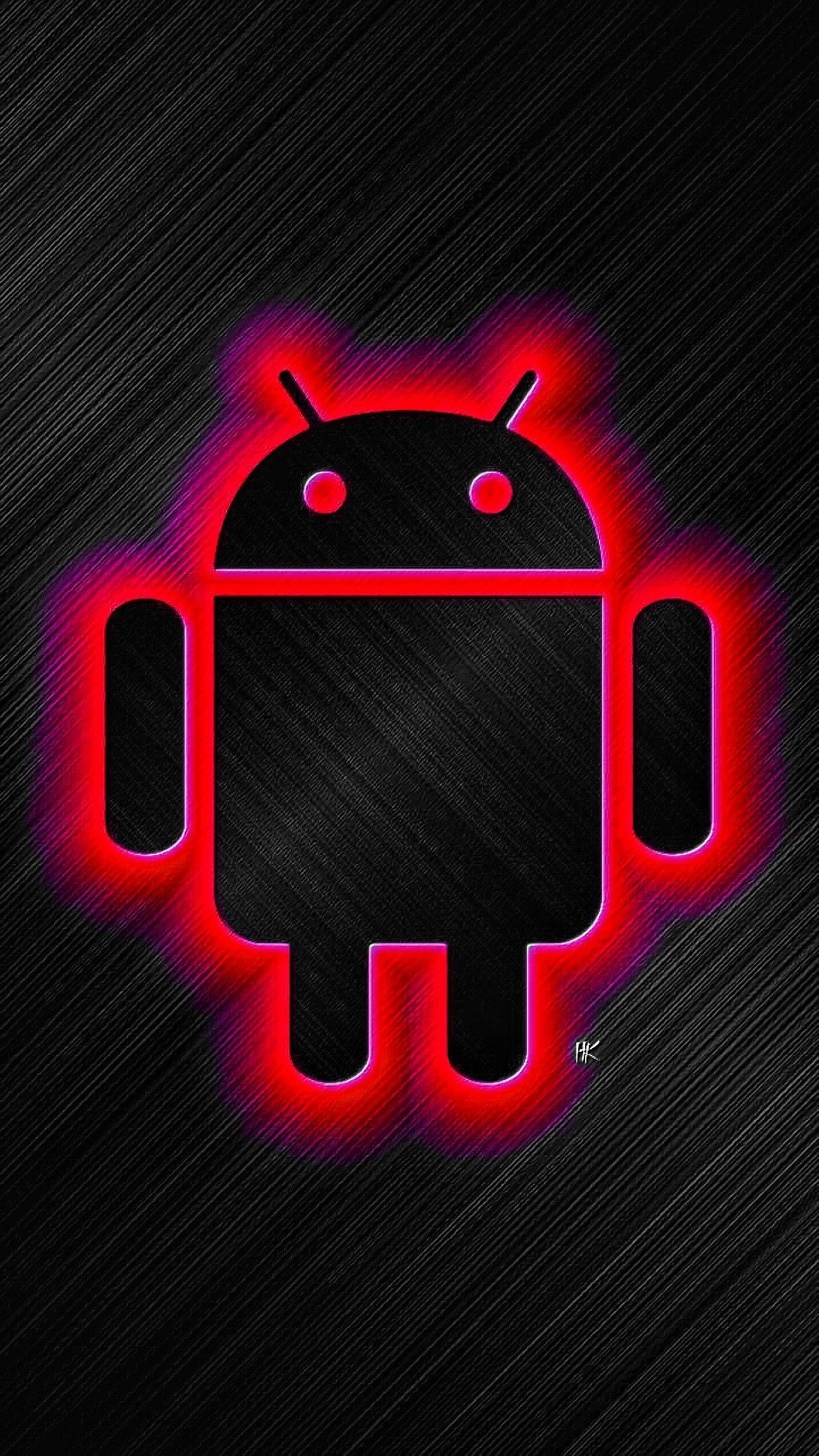Glowing Red Eyes 桌布 壁紙 — 一個發光的紅色Android機器人圖標帶有霓虹光環，在紋理化的黑色拉絲金屬背景上脫穎而出。