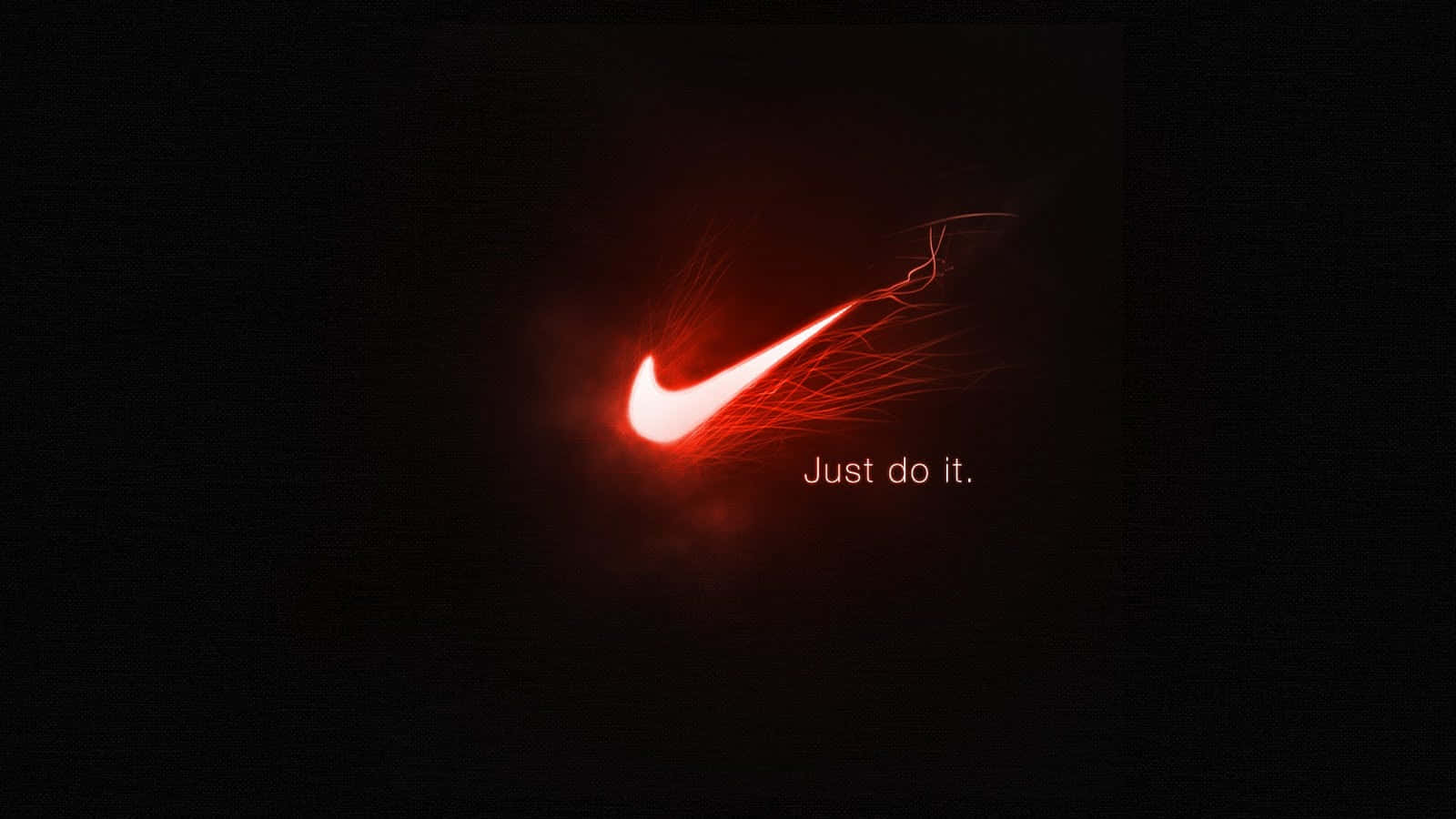 Red Nike 桌布 壁紙 — 一個發光的紅色Nike勾號帶有火焰軌跡，在黑色背景上與文字「Just do it.」一同閃耀。