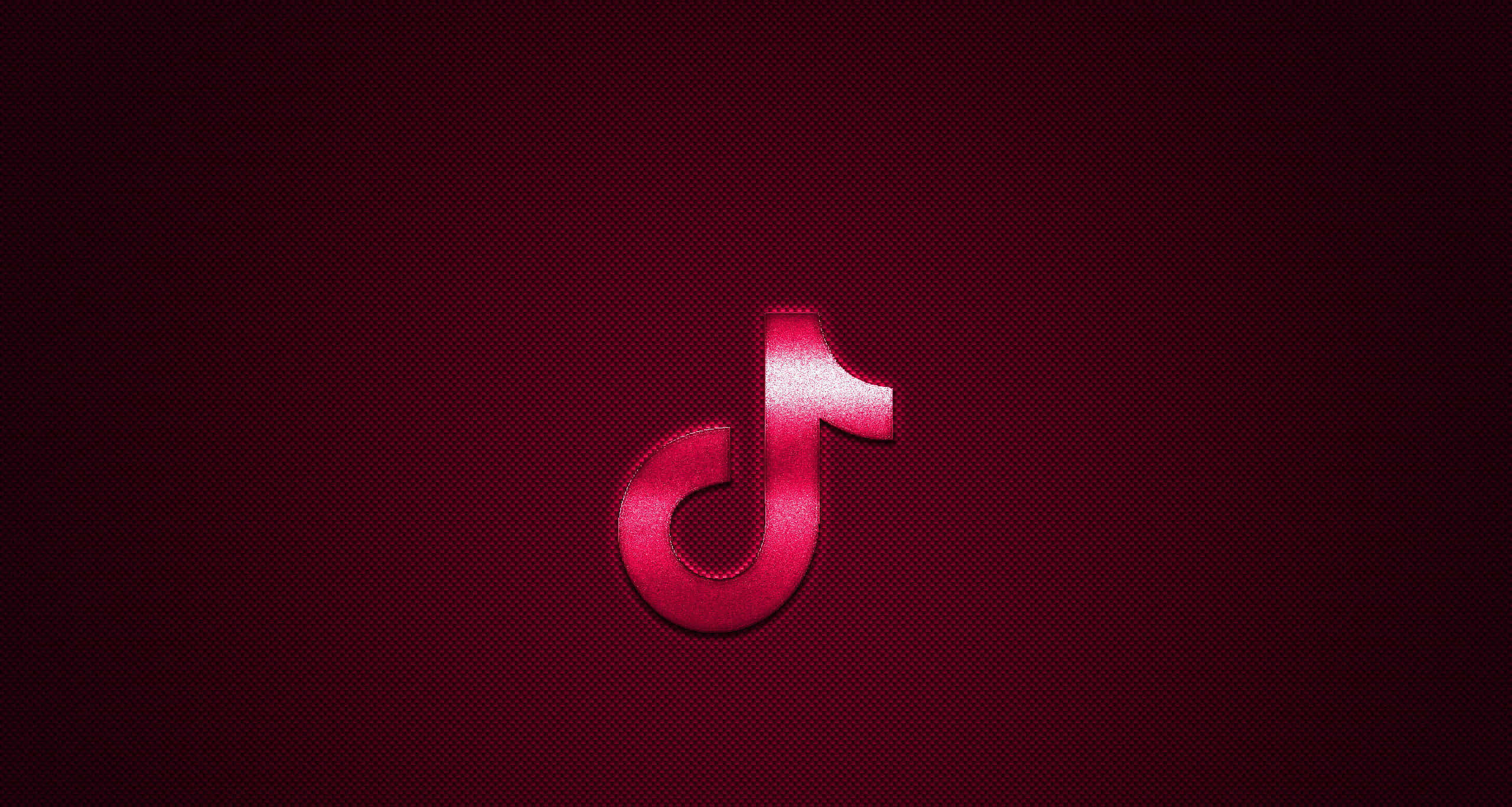 TikTok Logo 桌布 壁紙 — 一個發光的紅色TikTok標誌，置中於有紋理的深酒紅色背景上，帶有微妙的漸變燈光。