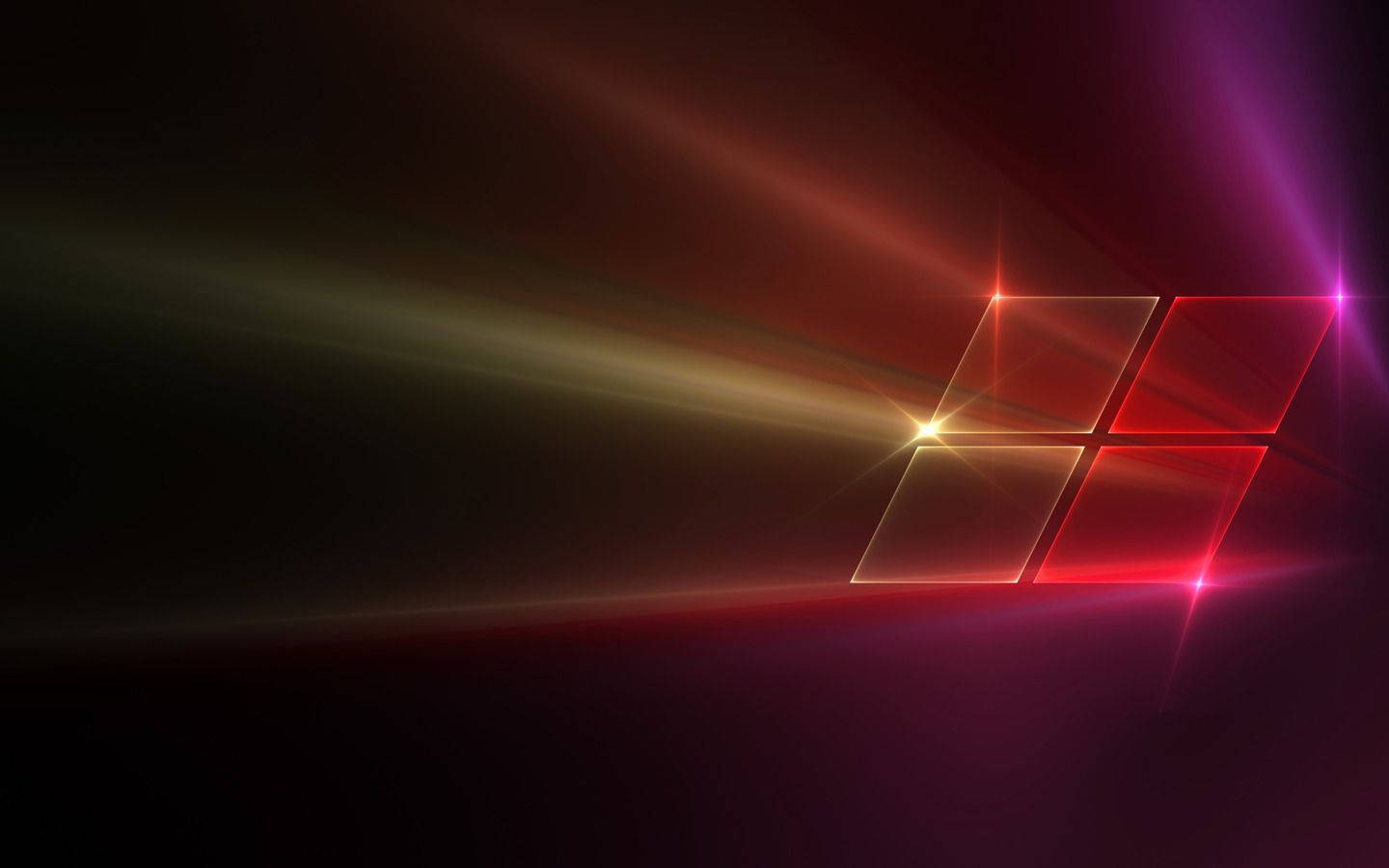 Windows 10 桌布 壁紙 — 一個發光的紅色和金色Windows標誌在深色漸變背景上散發出光線。