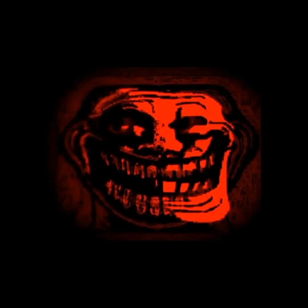 meme 桌布 壁紙 — 一個發光的紅色扭曲面孔，帶著寬闊的笑容和凸出的眼睛，背景是漆黑的黑色。