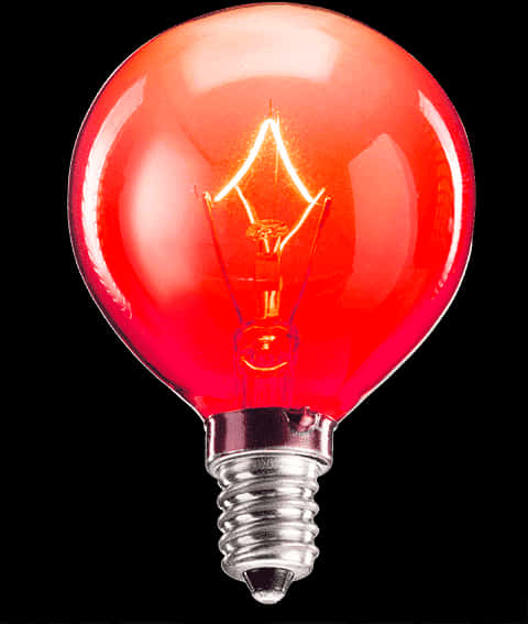 Red Light 桌布 壁紙 — 一個發光的紅色玻璃燈泡，帶有可見的燈絲，背景為黑色。