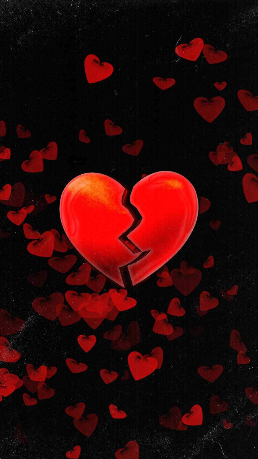 Heartbreaks 桌布 壁紙 — 一個發光的紅色破碎心臟，被漂浮的心臟環繞，背景為深色紋理。