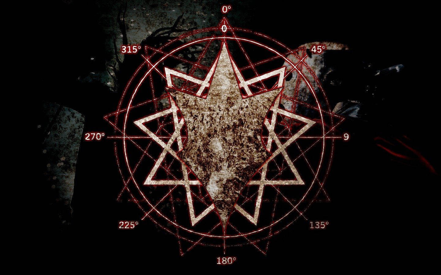illuminati 桌布 壁紙 — 一個發光的紅色神秘星盤指南針，帶有度數標記，從紋理中心向黑暗、裂開的石頭背景輻射。