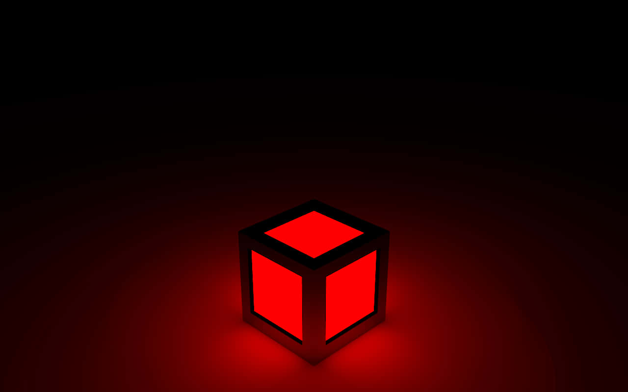 Red Neon 桌布 壁紙 — 一個發光的紅色立方體在黑暗背景下散發出溫暖的光芒，營造出簡約而神秘的氛圍。