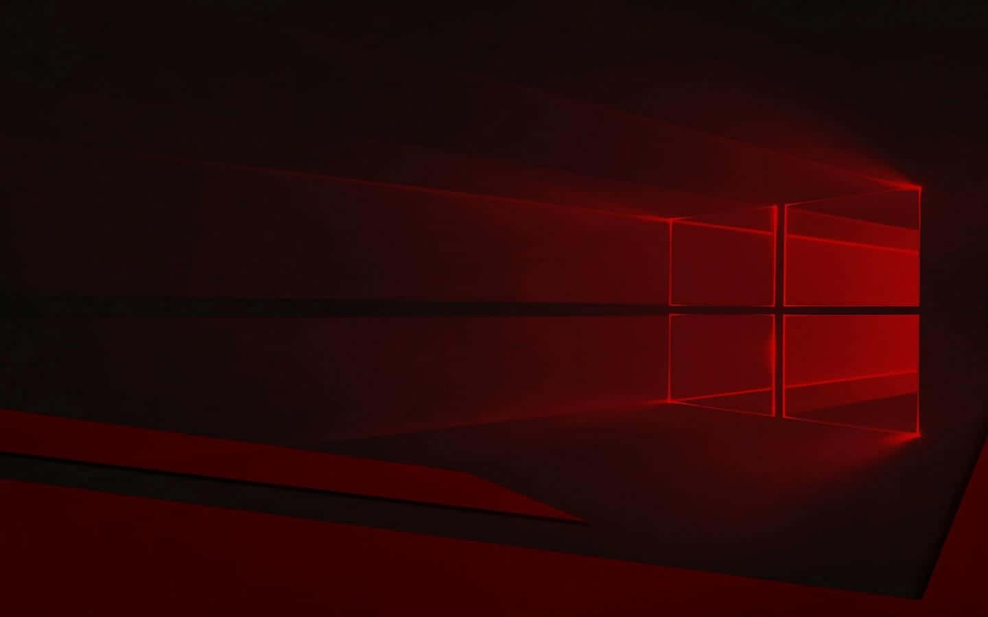 Dark Red Aesthetic 桌布 壁紙 — 一個發光的紅色視窗標誌在黑暗簡約表面上投射出銳利的光束，呈現時尚的數位藝術風格。