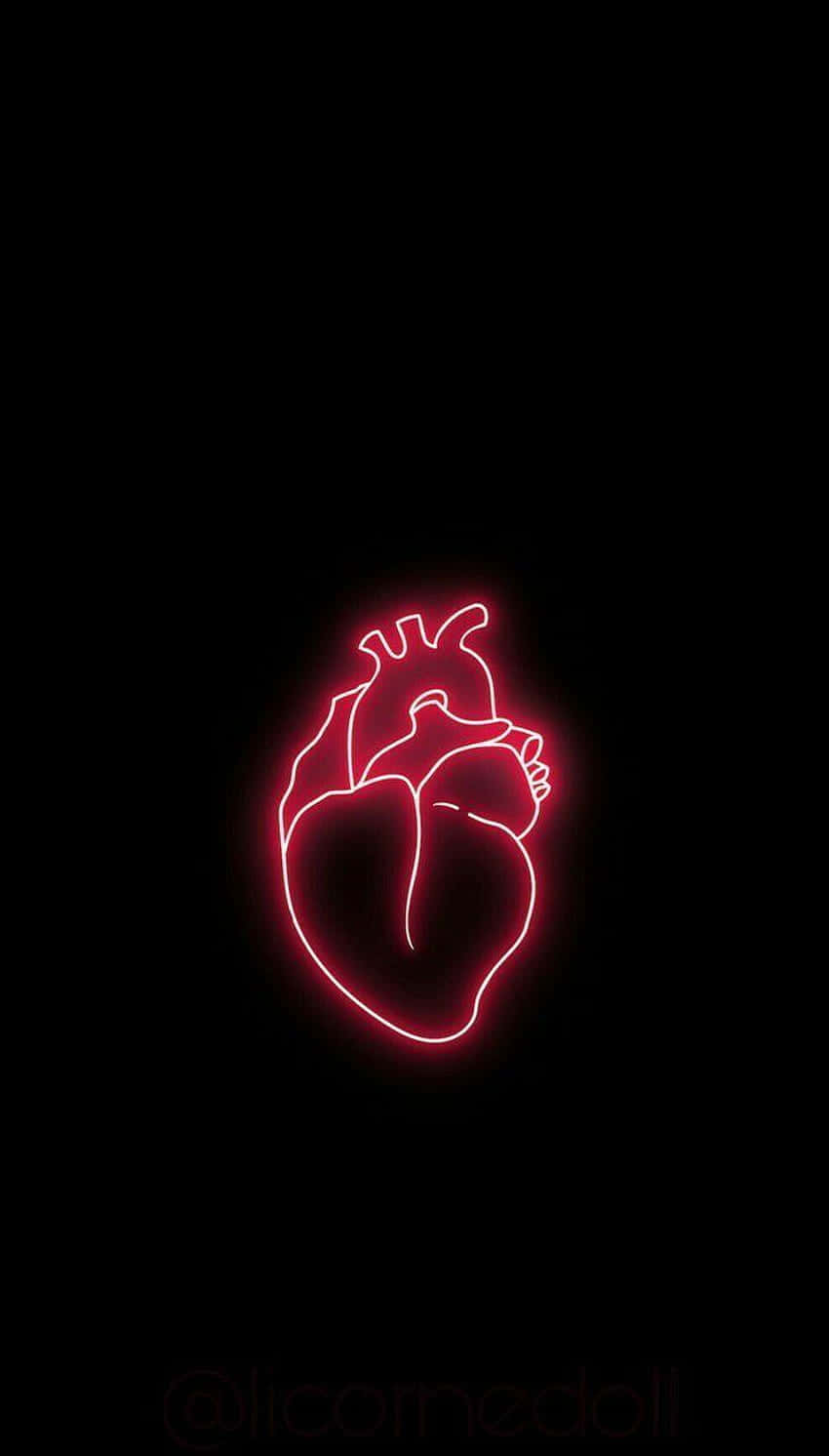 Broken Heart Aesthetics 桌布 壁紙 — 一個發光的紅色霓虹燈人體心臟輪廓在漆黑背景上跳動。