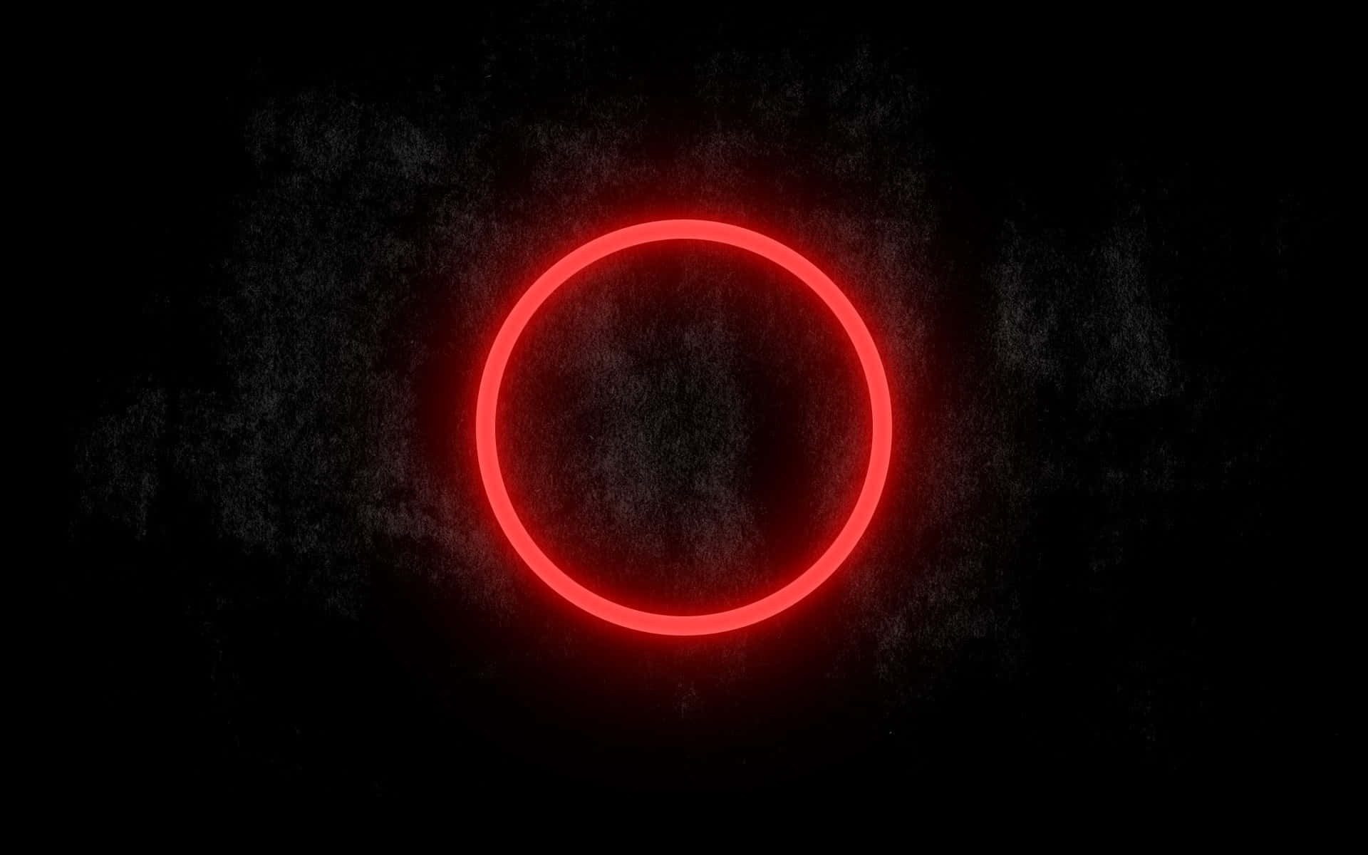 Dark Circles 桌布 壁紙 — 一個發光的紅色霓虹燈圈在帶有微妙煙霧效果的紋理深色背景上脈動。