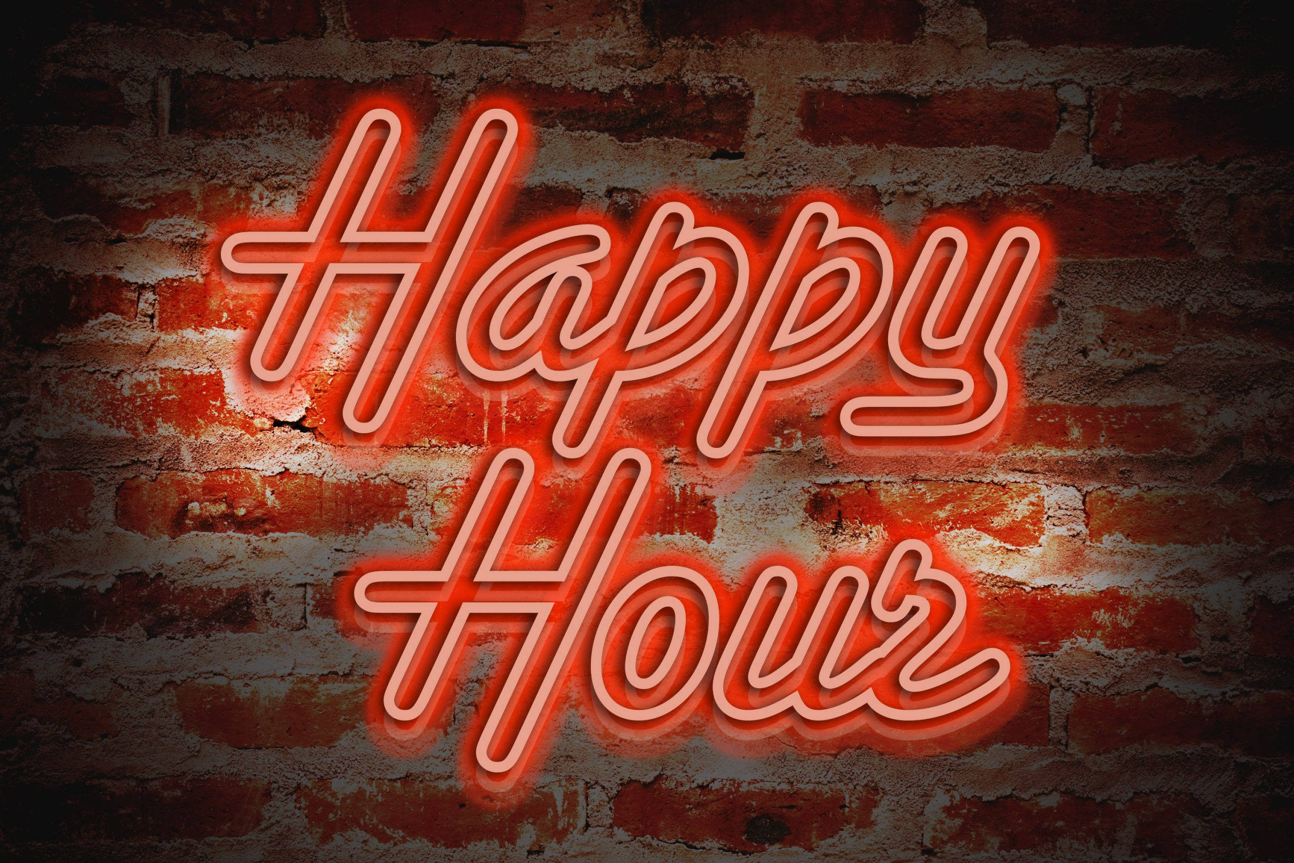 Hour 桌布 壁紙 — 一個發光的紅色霓虹燈牌，上面寫著「Happy Hour」，在風化的磚牆上投下溫暖的光芒。