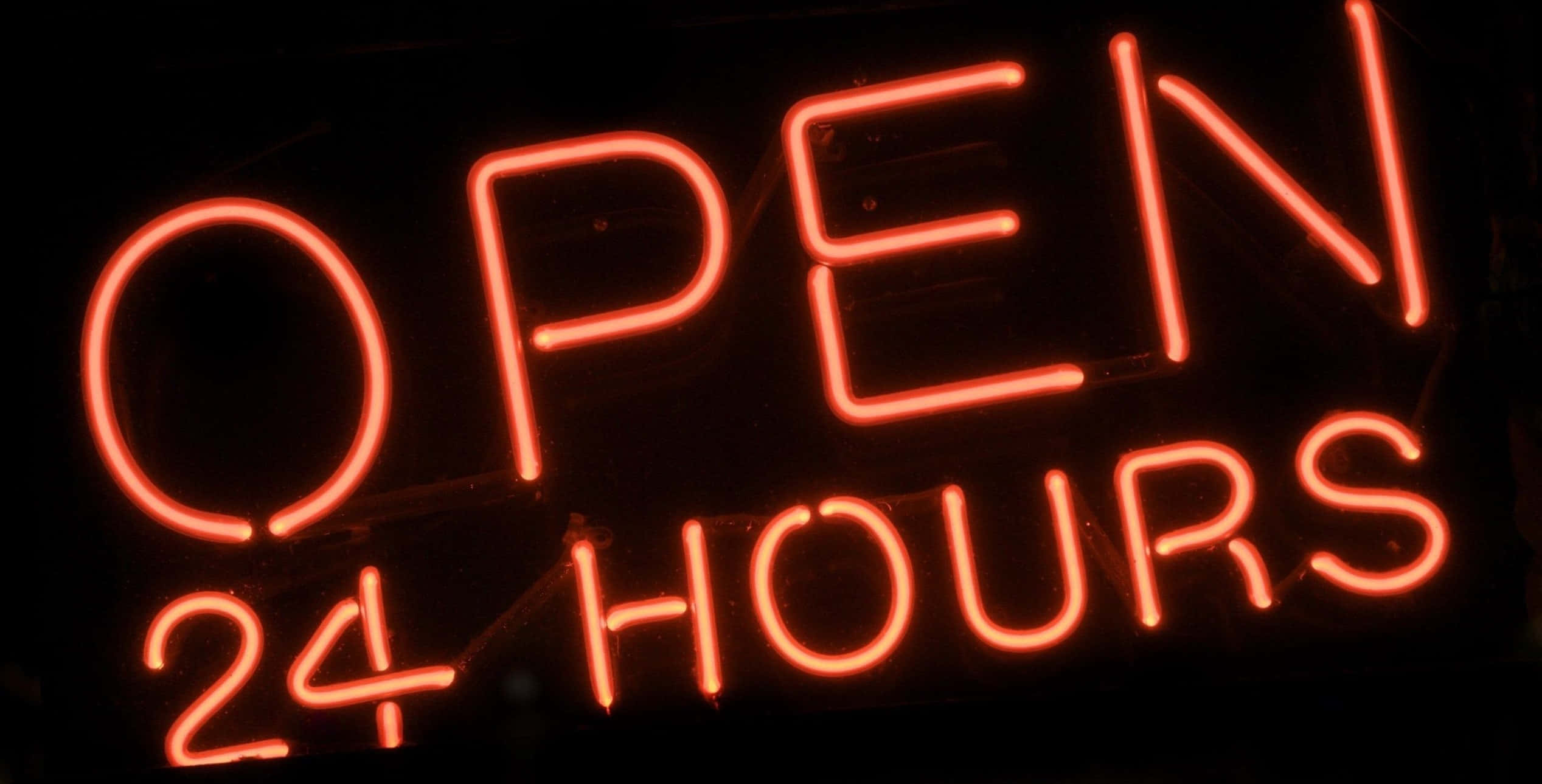 neon sign 桌布 壁紙 — 一個發光的紅色霓虹燈牌寫著「24小時營業」，背景是漆黑的。