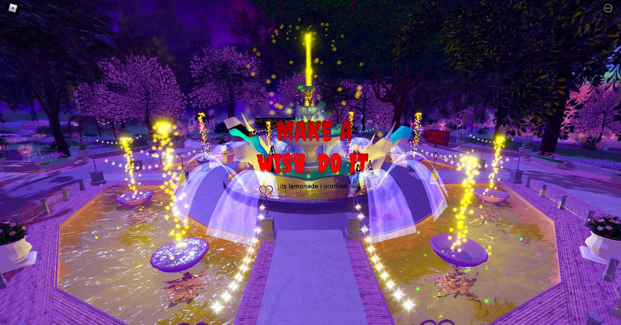 high 桌布 壁紙 — 一個發光的紫色噴泉，帶有金色火花和一個「MAKE A WISH DO IT」標誌，在充滿活力的夜間公園中。