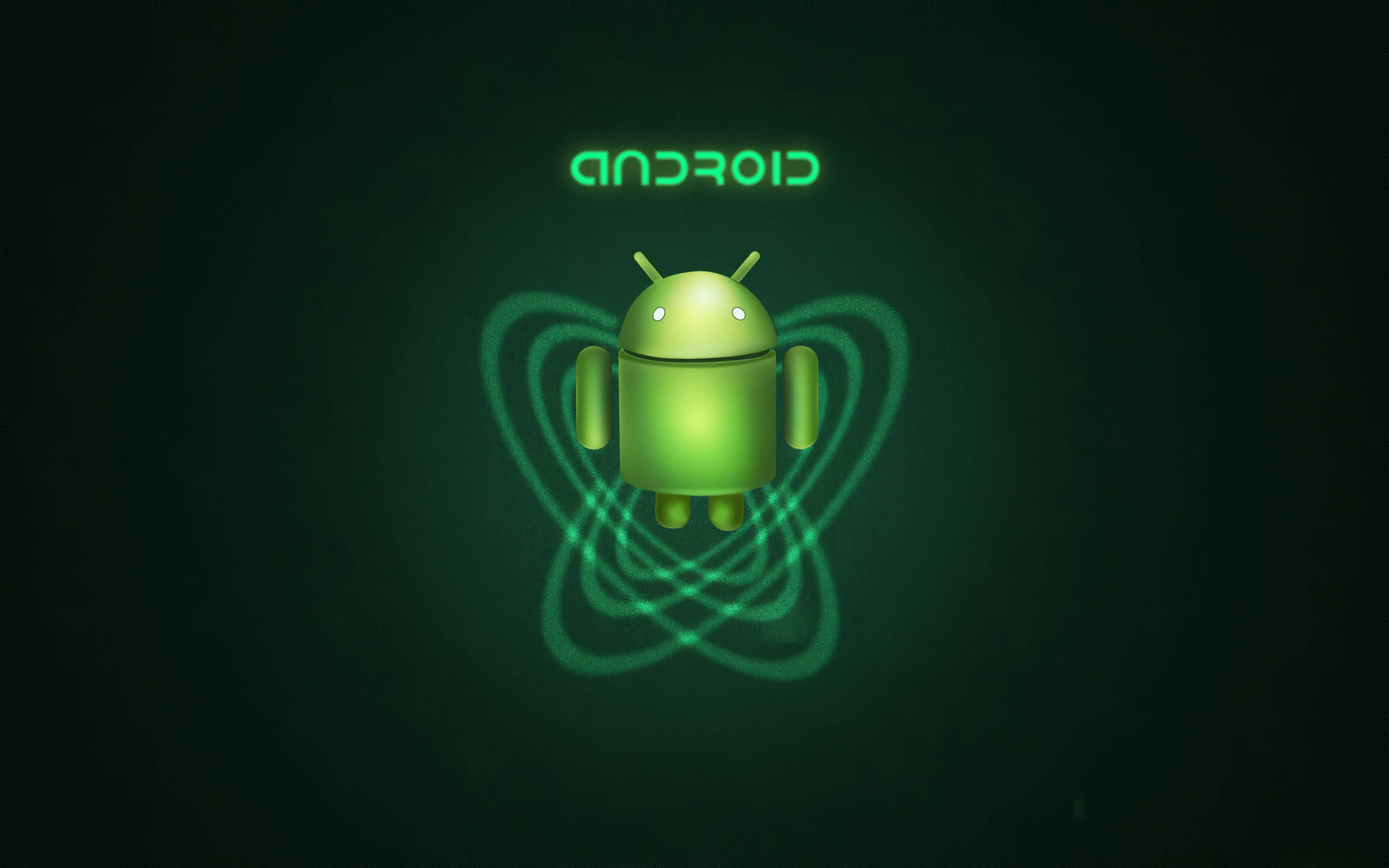 Android Desktop 桌布 壁紙 — 一個發光的綠色Android機器人圖示漂浮在深色背景上，帶有旋轉的能量線條和上方反轉的文字。