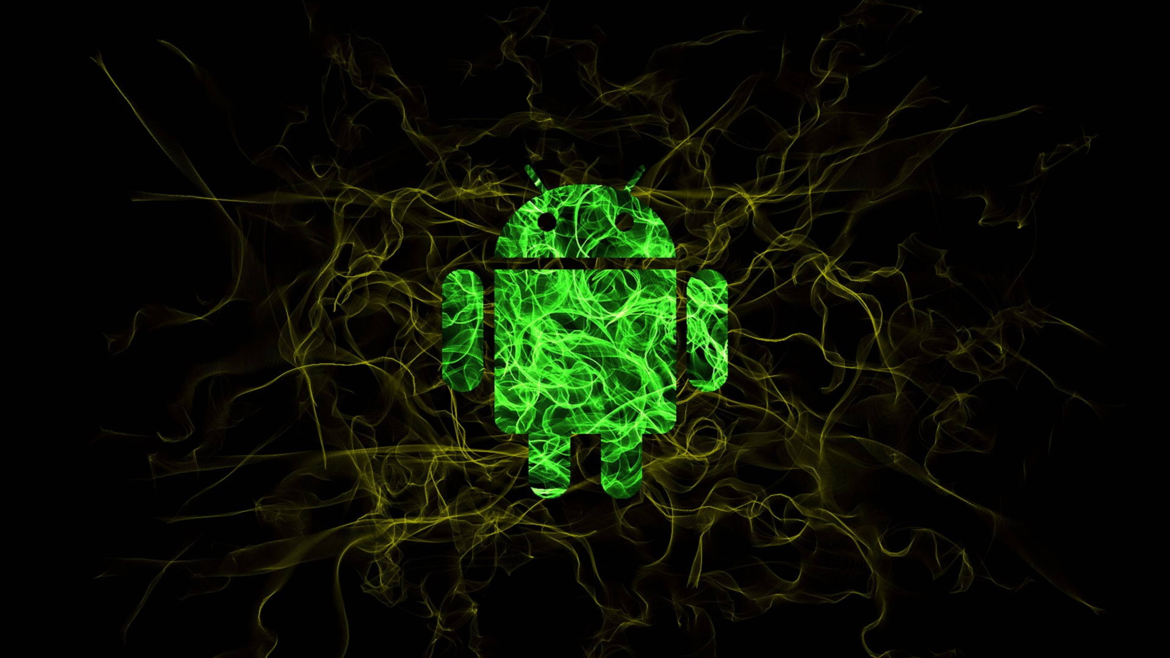 駭客 桌布 壁紙 — 一個發光的綠色Android機器人圖標在黑色背景上脈動著電能，背景中旋轉著金色的捲鬚。