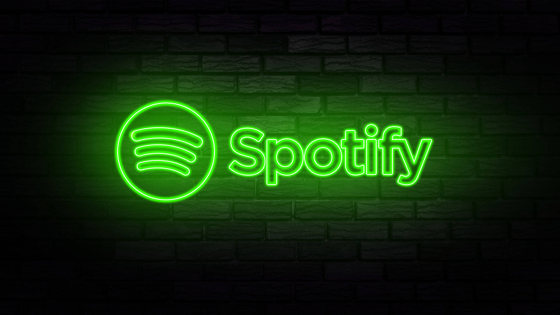 Spotify 桌布 壁紙 — 一個發光的綠色Spotify霓虹燈牌照亮了深色磚牆，鮮豔的光線投射出柔和的陰影。