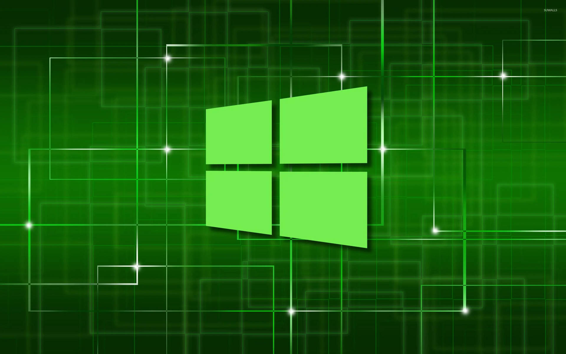 綠色Windows標誌在發光的數字網格背景上。 — Microsoft 壁紙