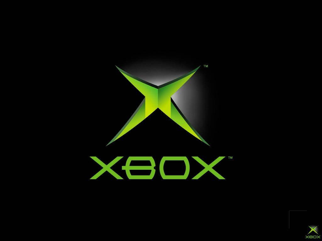 Xbox 桌布 壁紙 — 一個發光的綠色Xbox標誌，帶有風格化的X和文字，居中在黑色背景上。