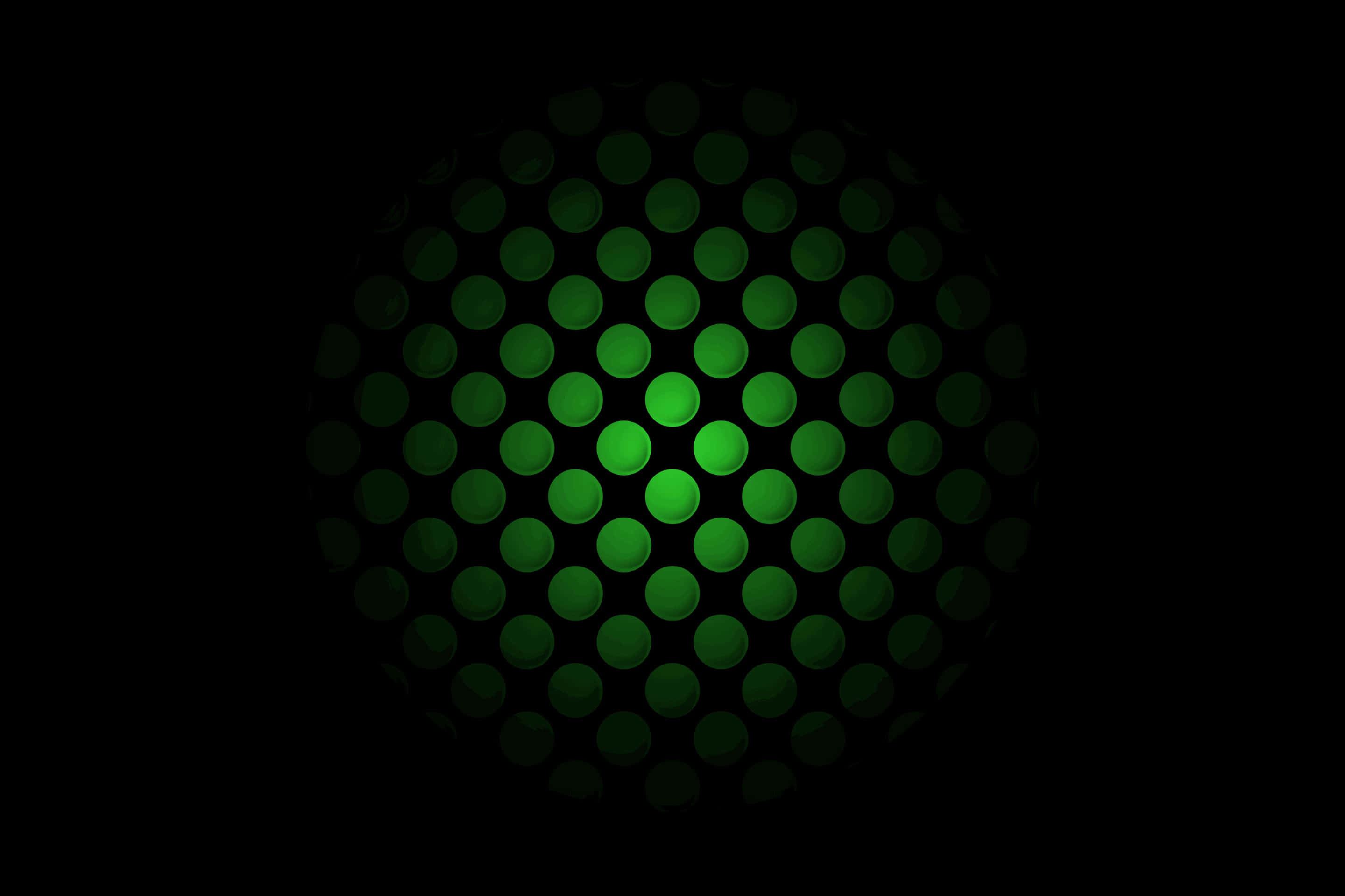 Xbox 桌布 壁紙 — 一個發光的綠色圓形點狀圖案在黑色背景上柔和地散發光芒。