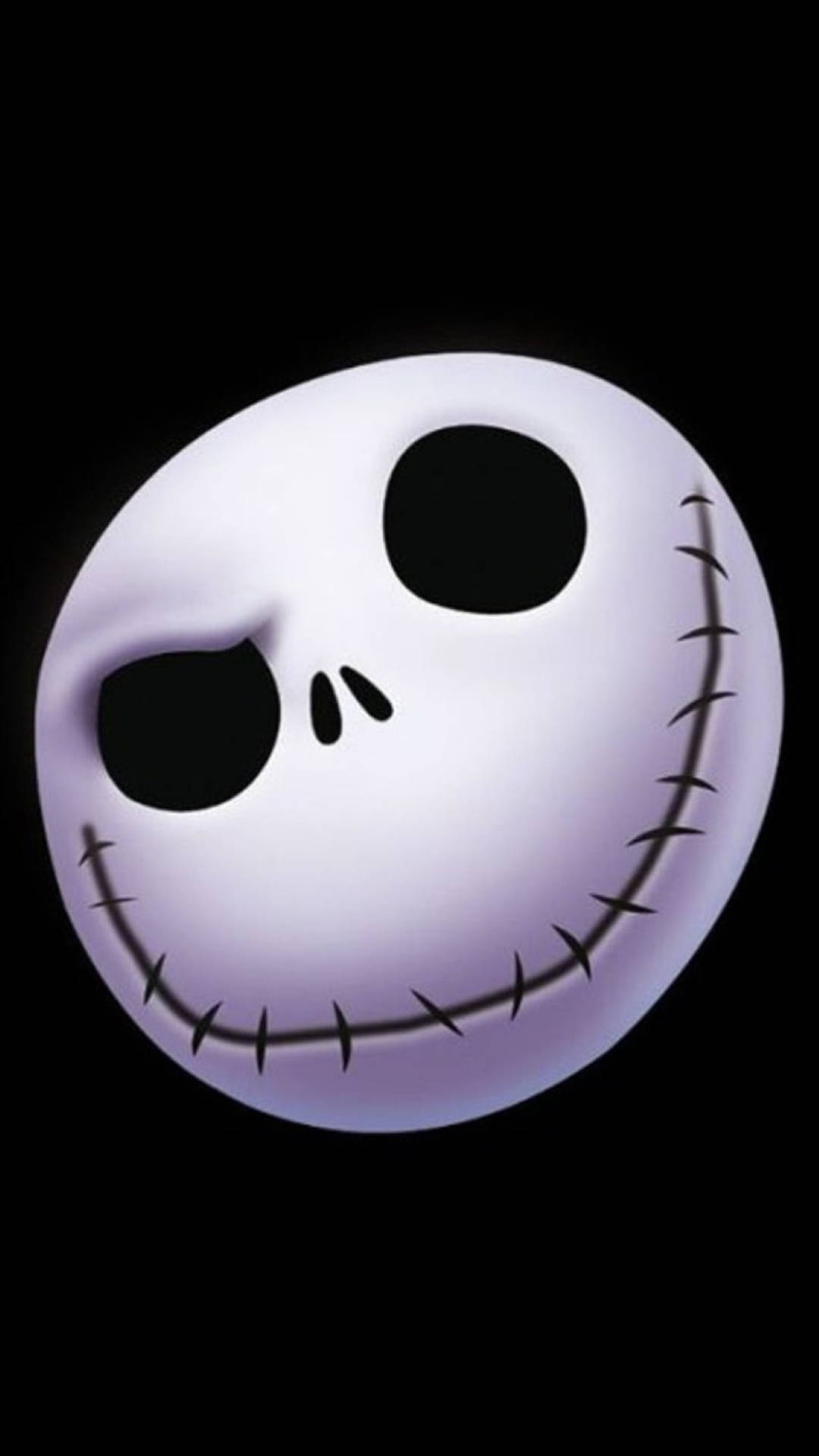 Jack Skellington 桌布 壁紙 — 一個發光的縫合骷髏臉，一隻眼睛閉著，咧嘴大笑，背景為黑色。