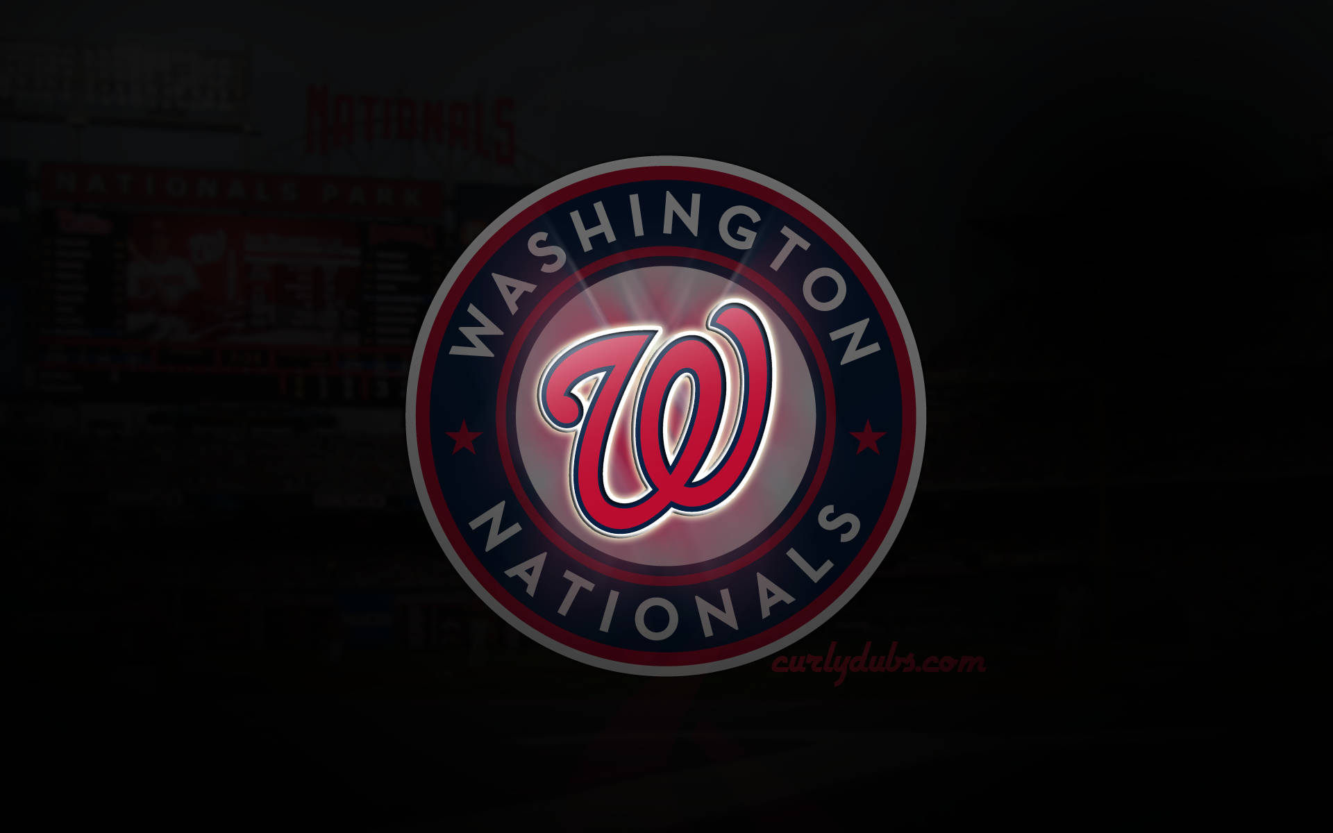 Nationals 桌布 壁紙 — 一個發光的華盛頓國民隊標誌，置於深色背景中央，帶有隱約的球場標誌。