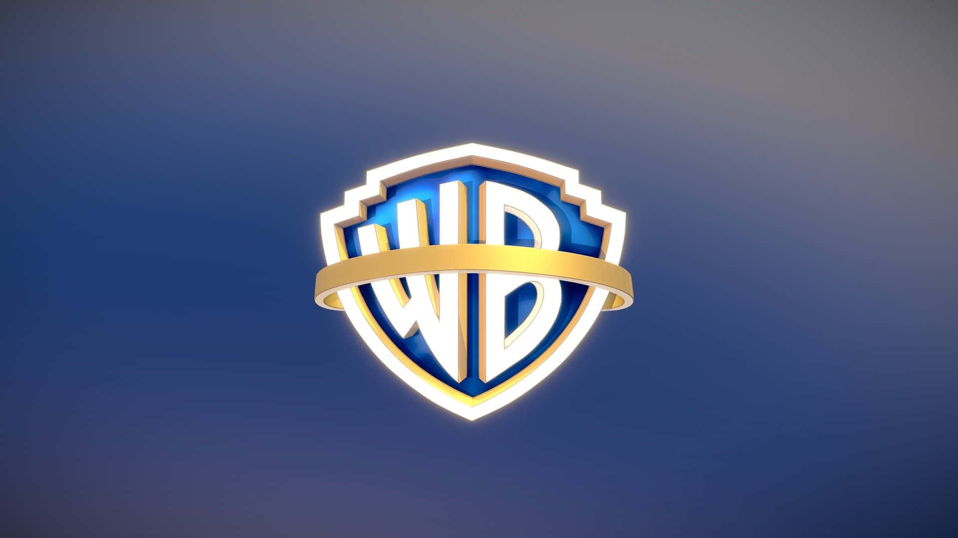 Warner Bros 桌布 壁紙 — 一個發光的華納兄弟盾牌標誌，帶有金色和白色點綴，居中在漸變藍色背景上。